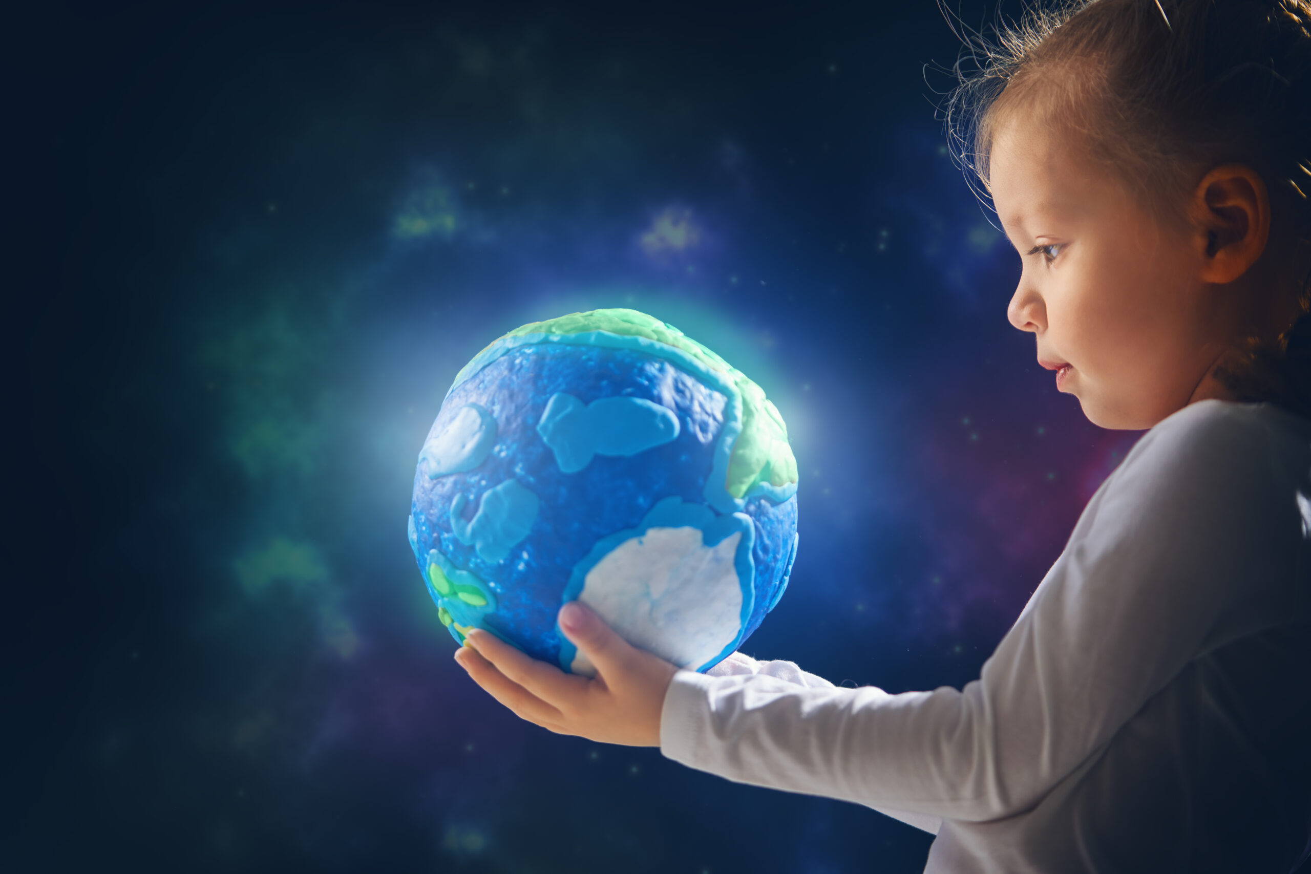 Kid with globe.