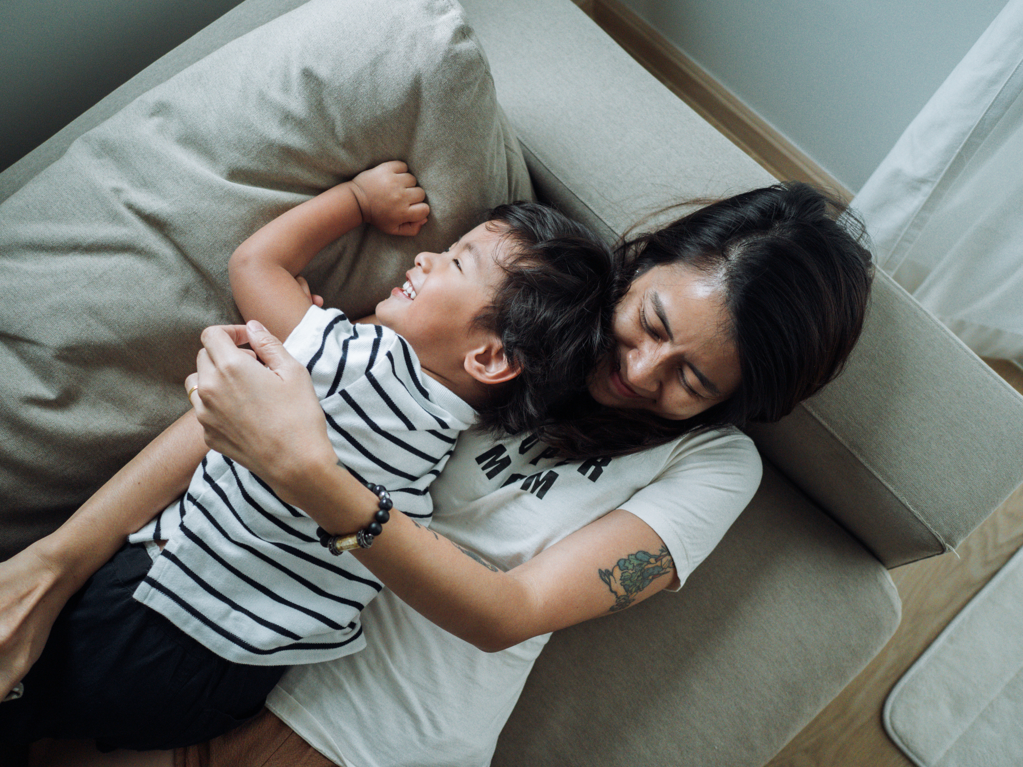 imperfect-mom-hugging-son
