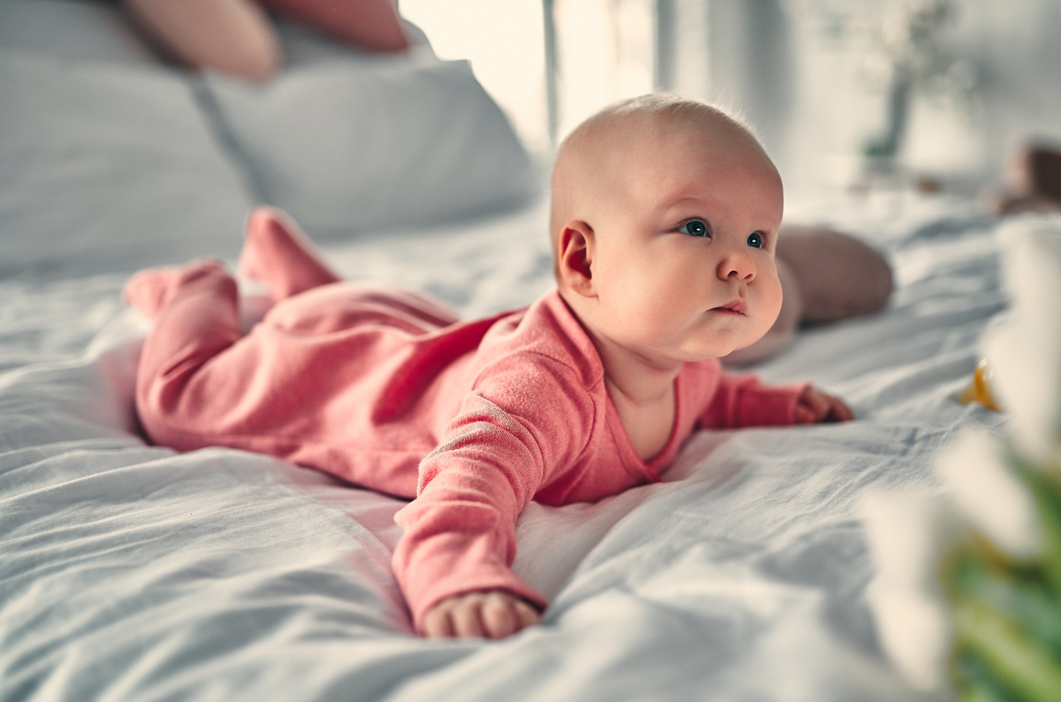 Baby girl on bed