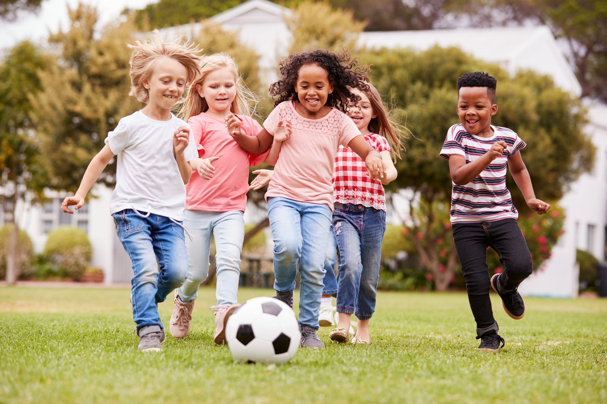 diverse group of kids playing