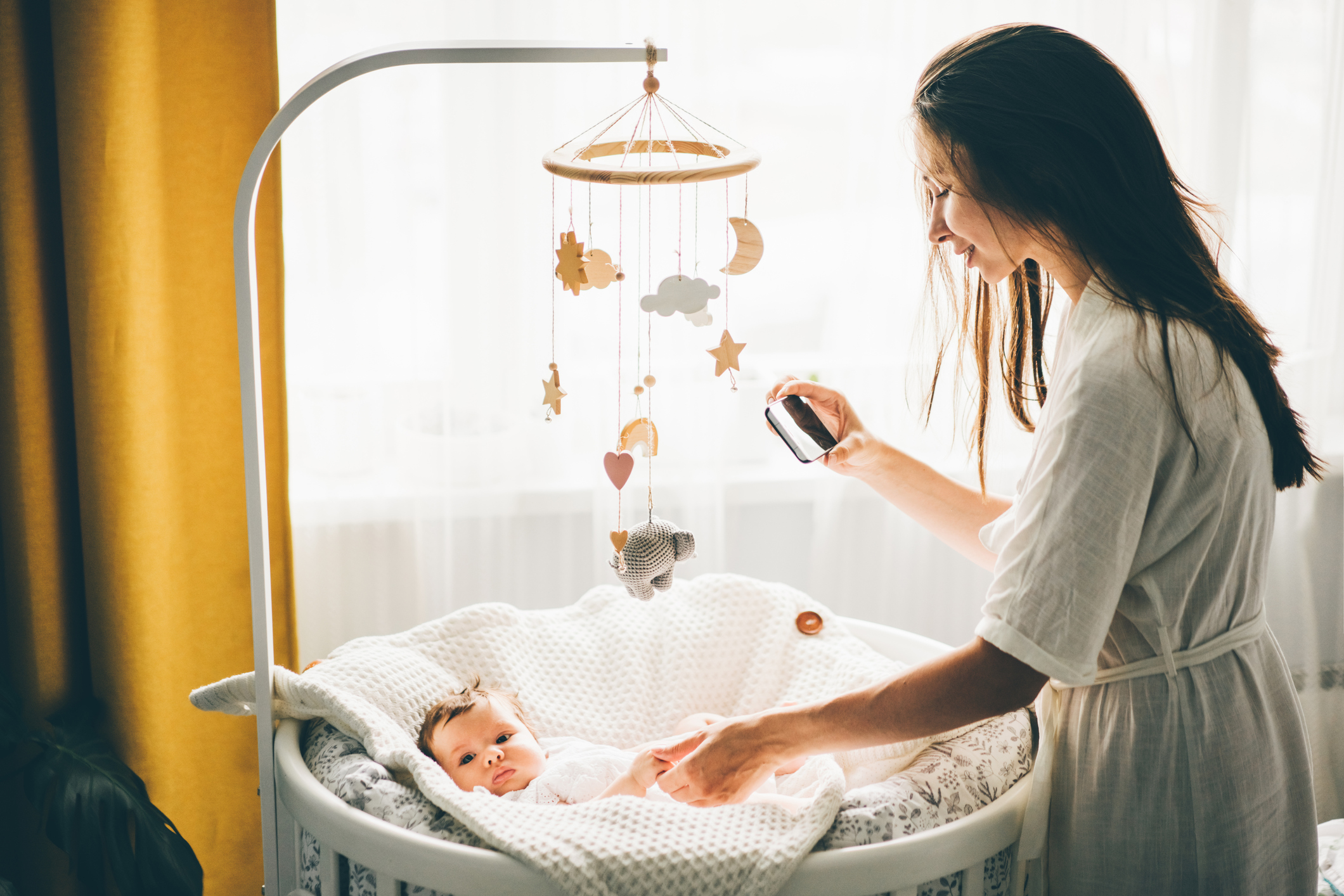 mom taking instagram baby