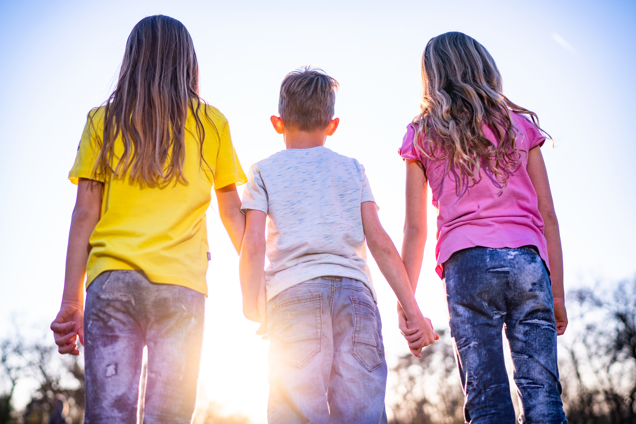 three-kids-holding-hands