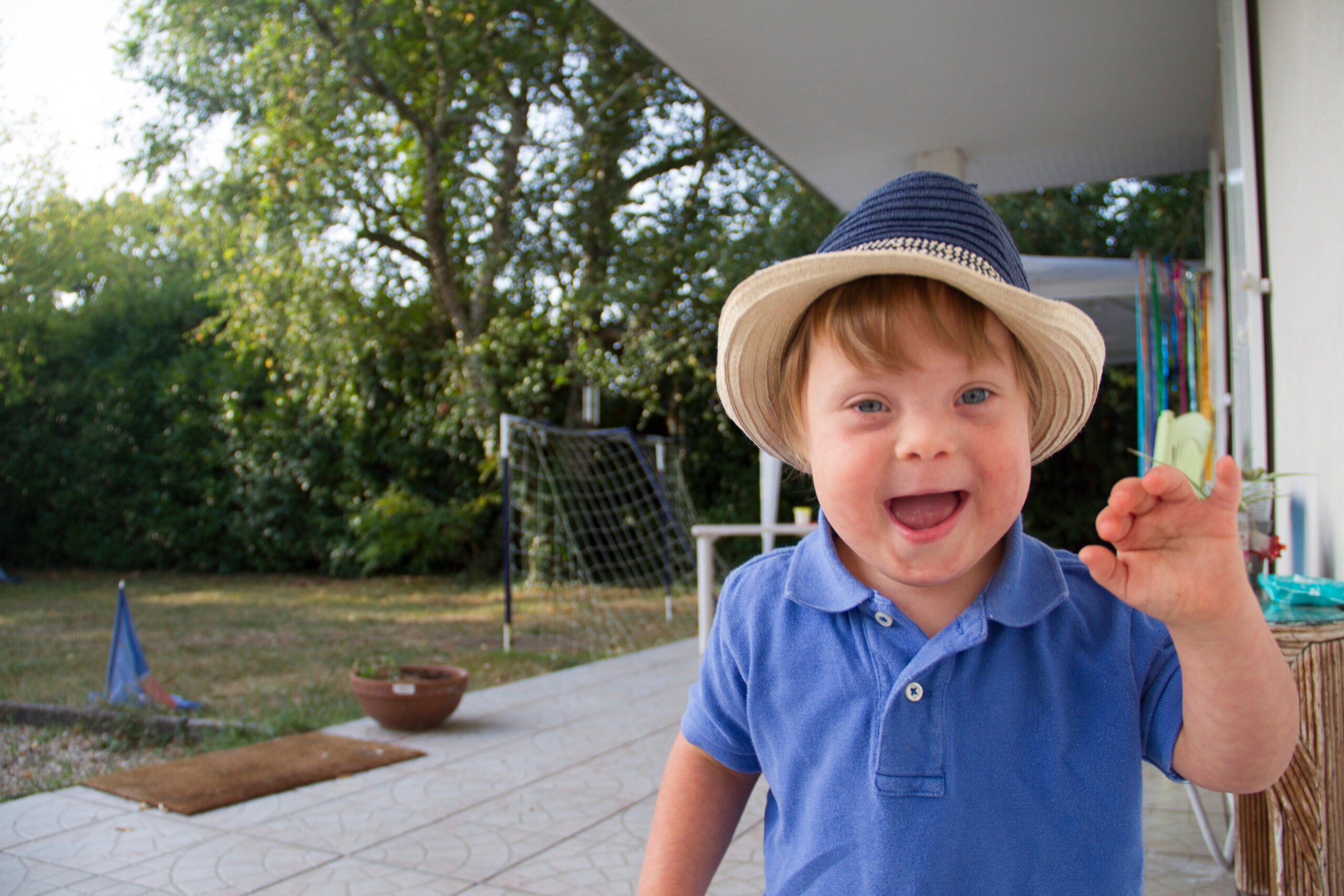 The circle of life and the daily routine of a very young boy with Trisomy 21.