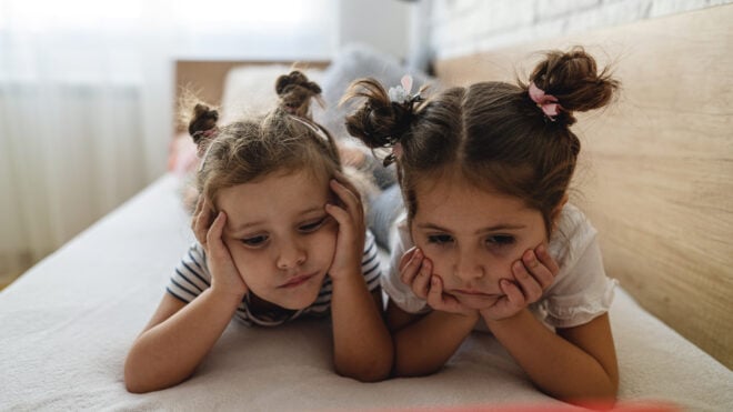 two-girls-watching-tablet