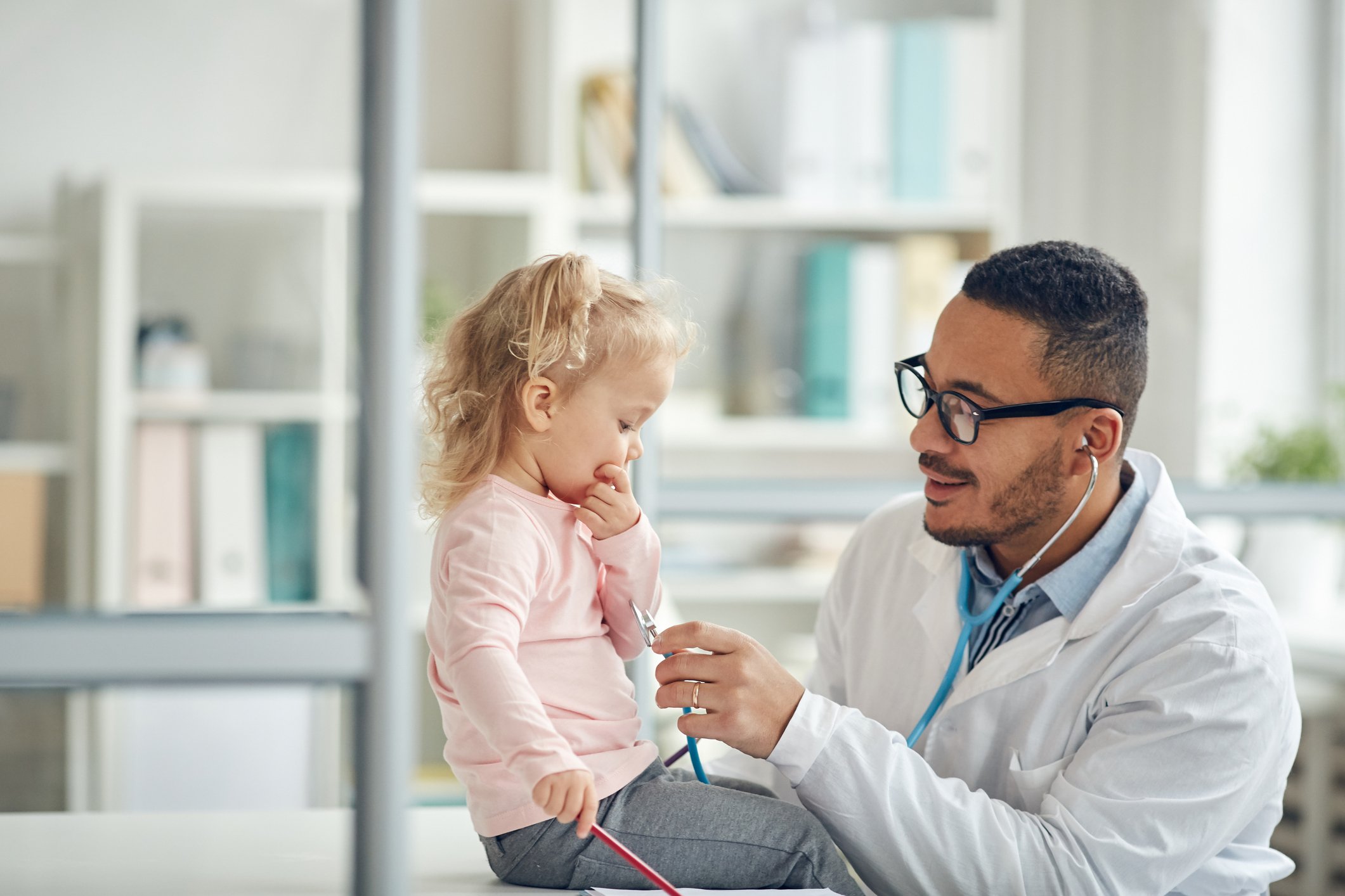 Doctor Examining Little Girl