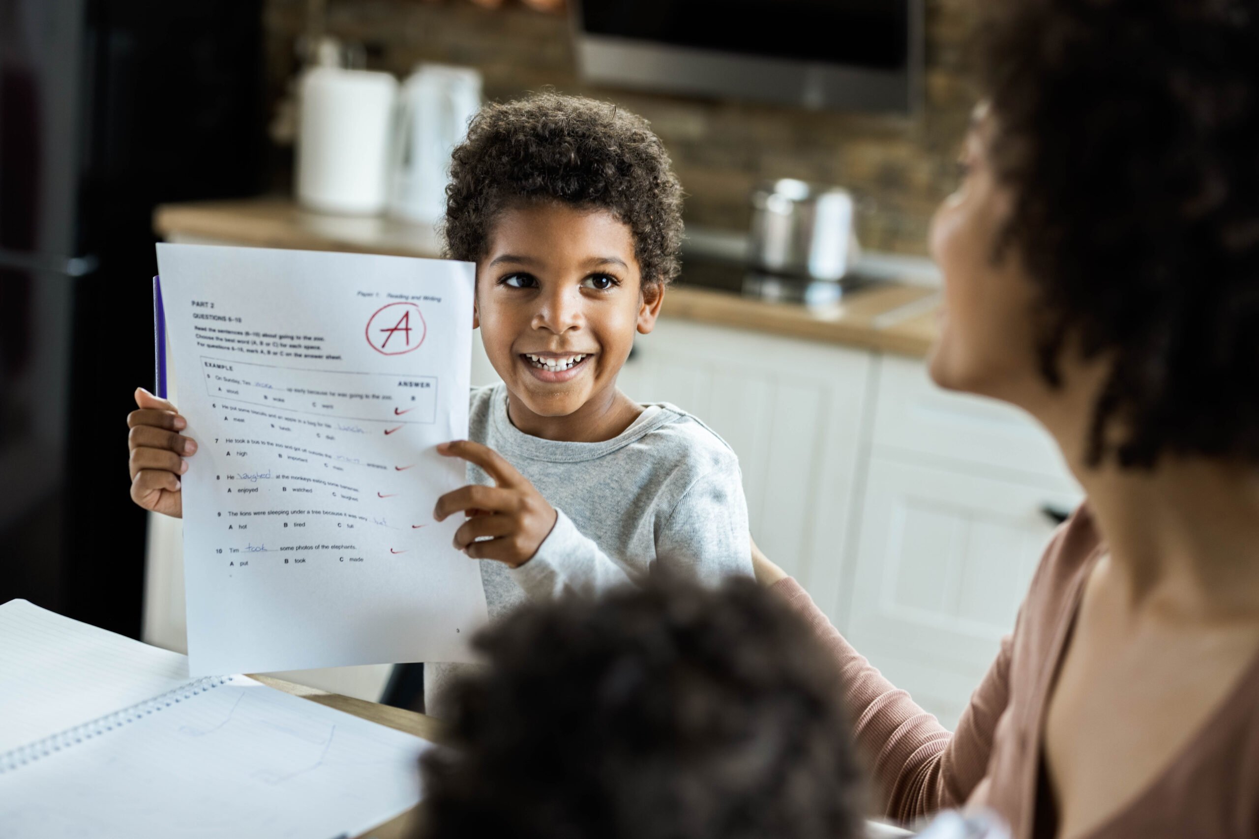 kid showing mom grade