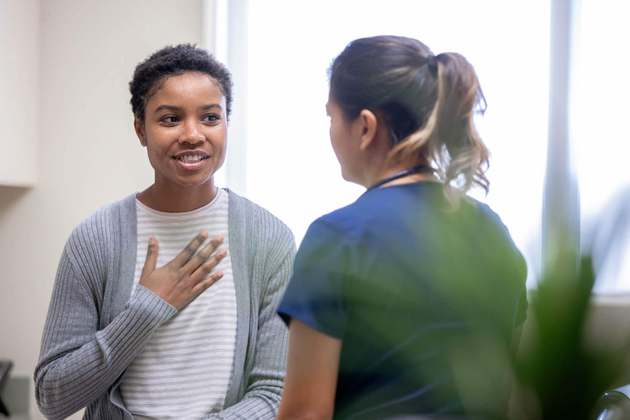 woman talking to doctor