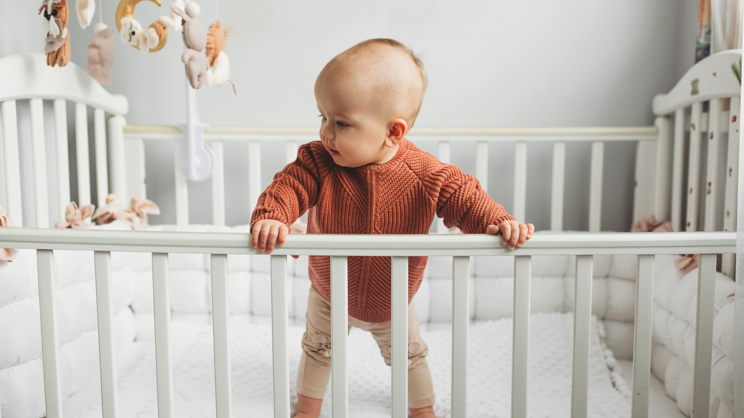 Baby escaping his crib