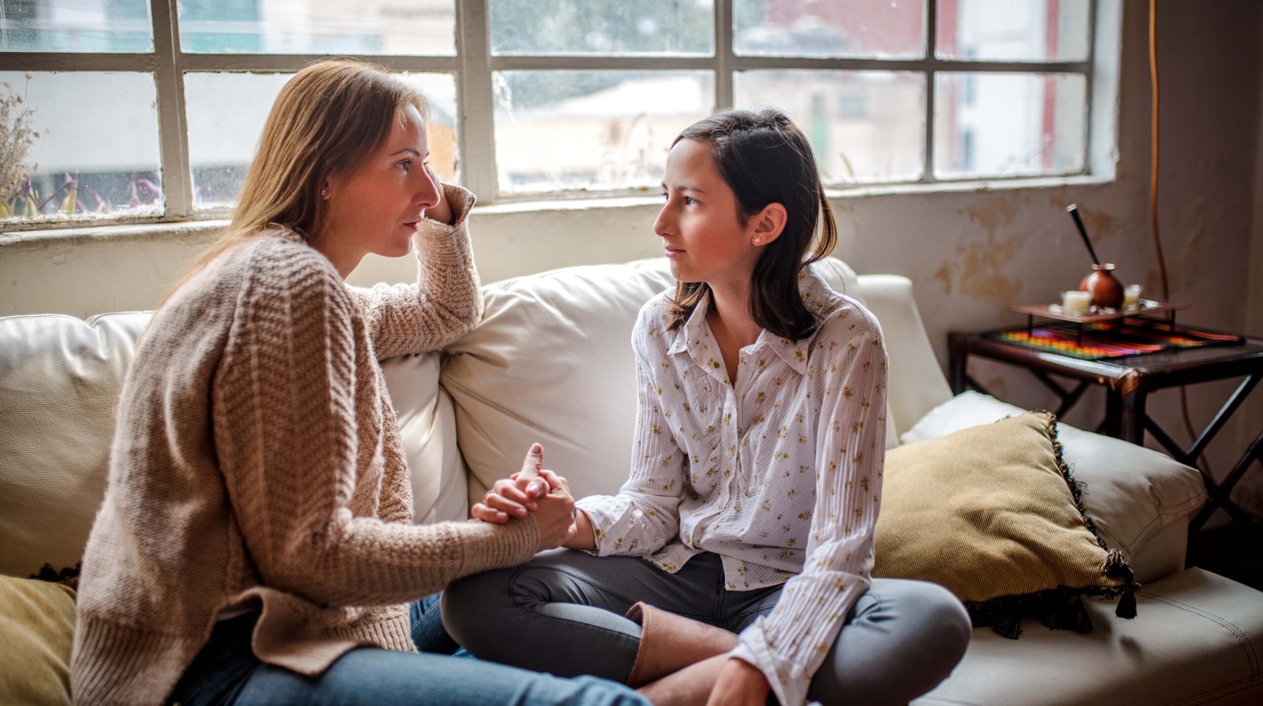 Mother and daughter having a talk.