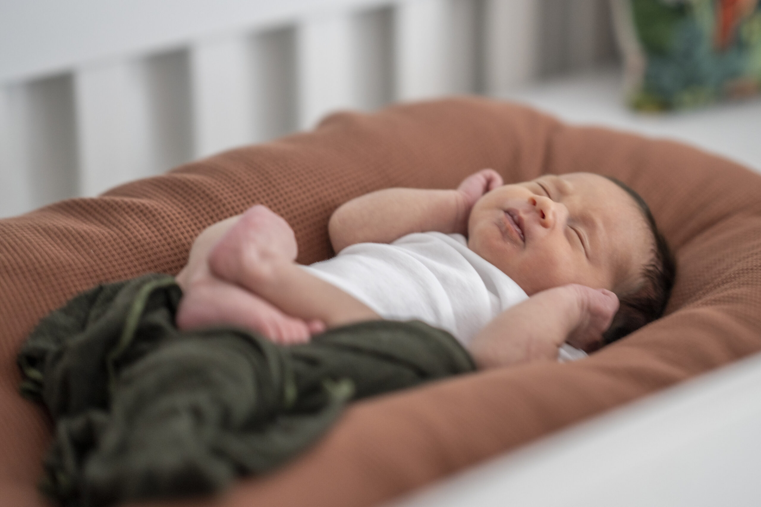 One week old newborn baby sleeping