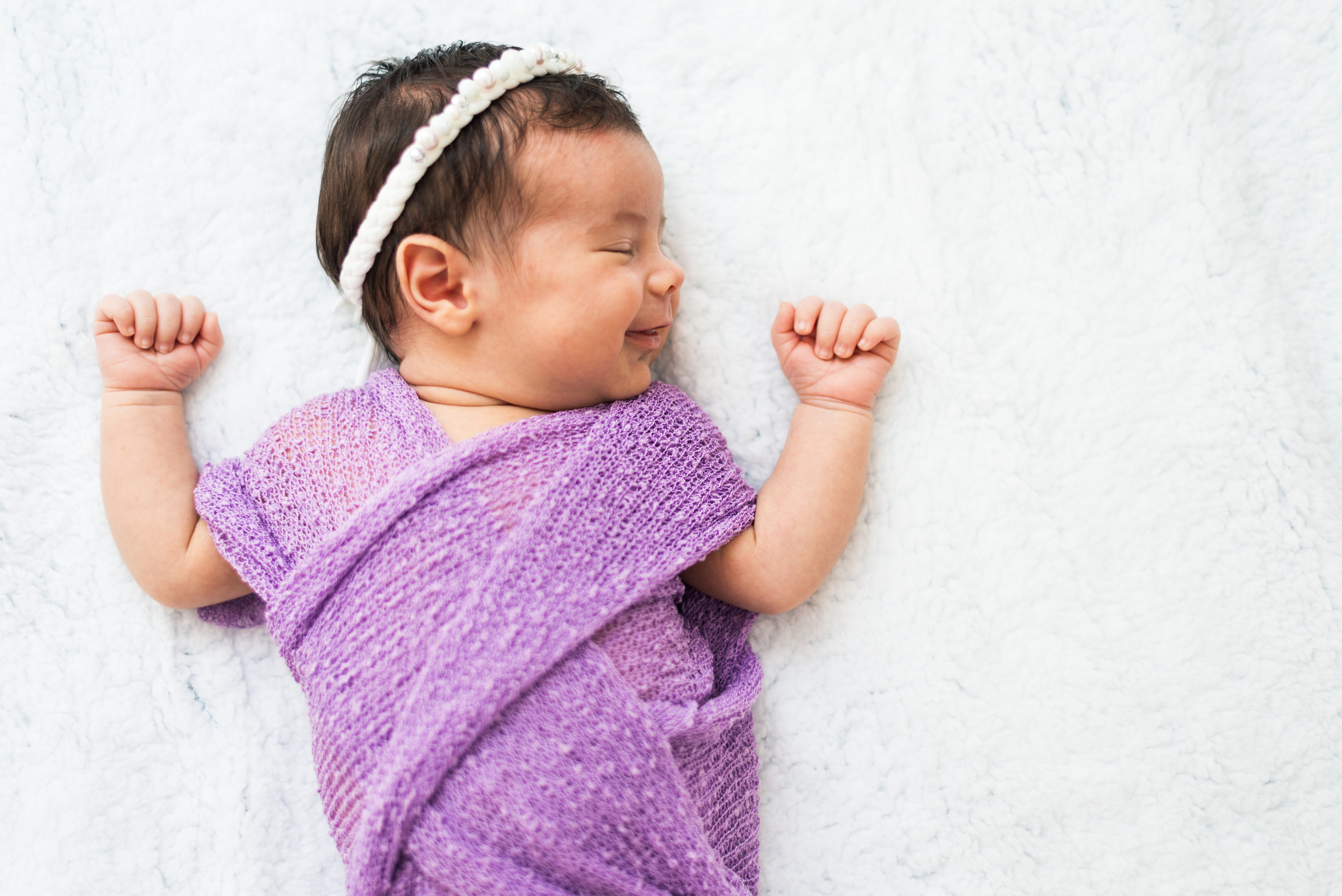 Sleeping newborn baby girl