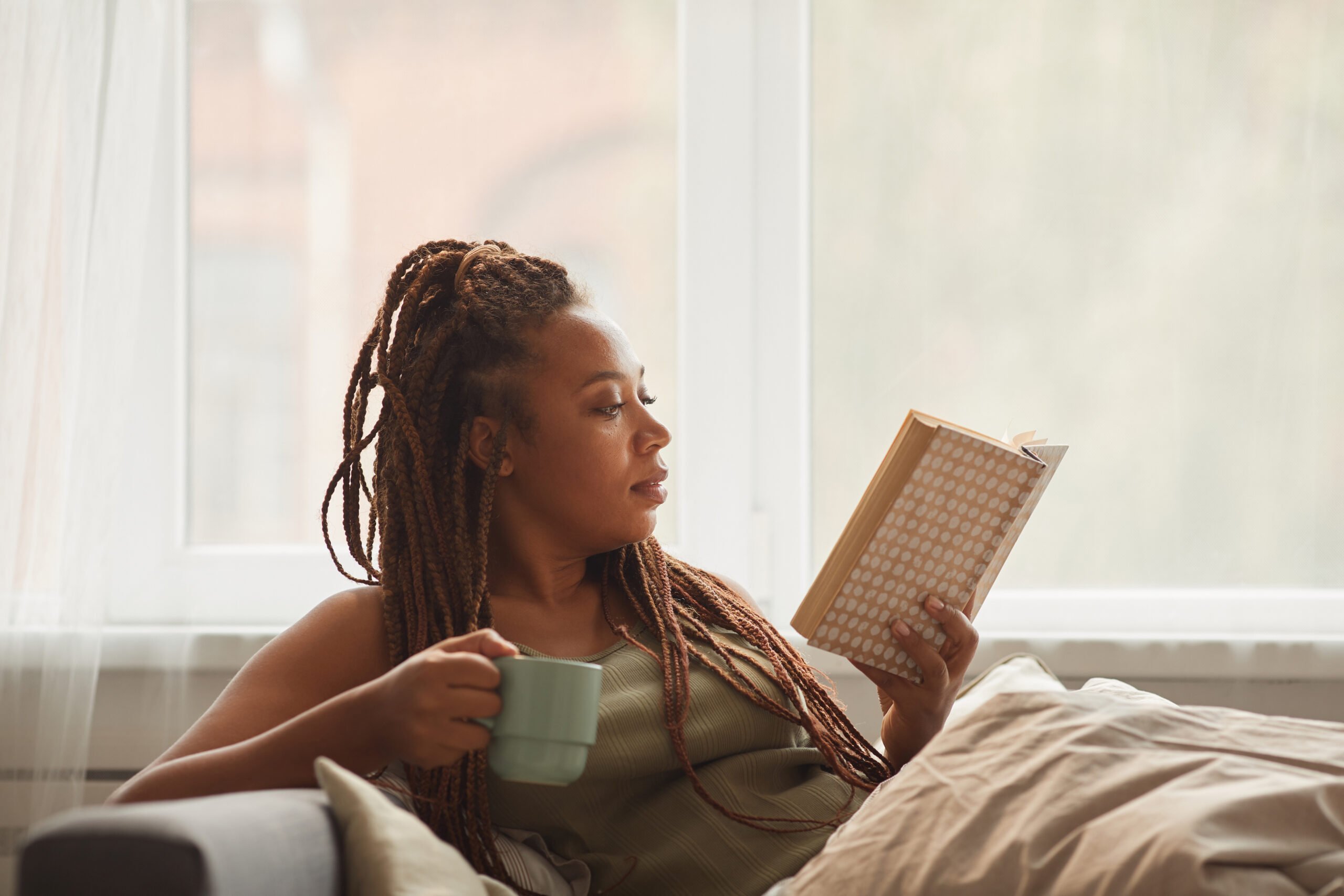 woman relaxing in bed