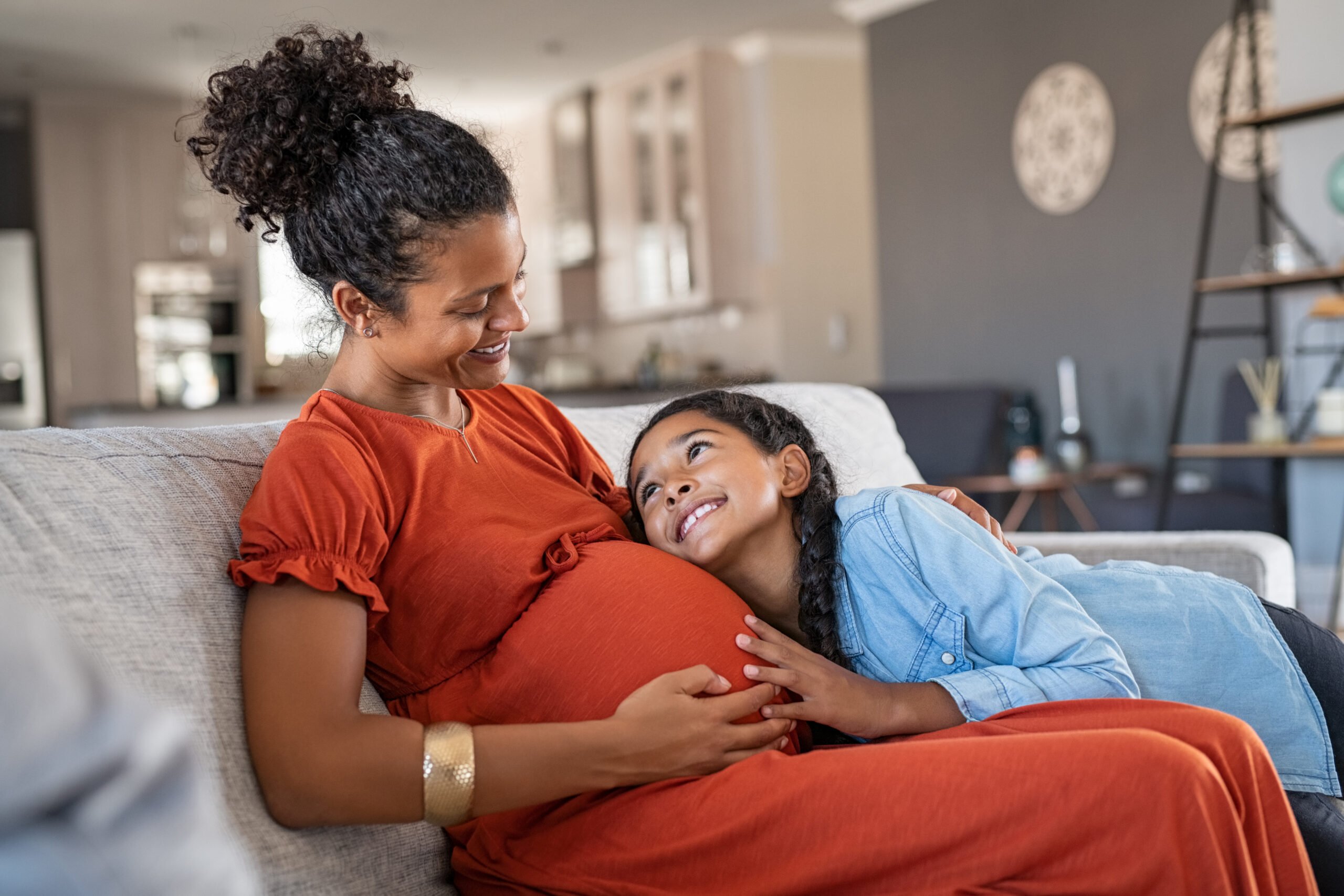 pregnant mom with daughter