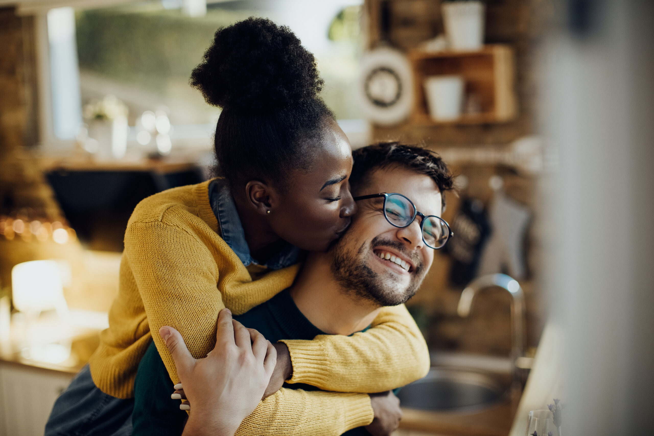 couple hugging at home