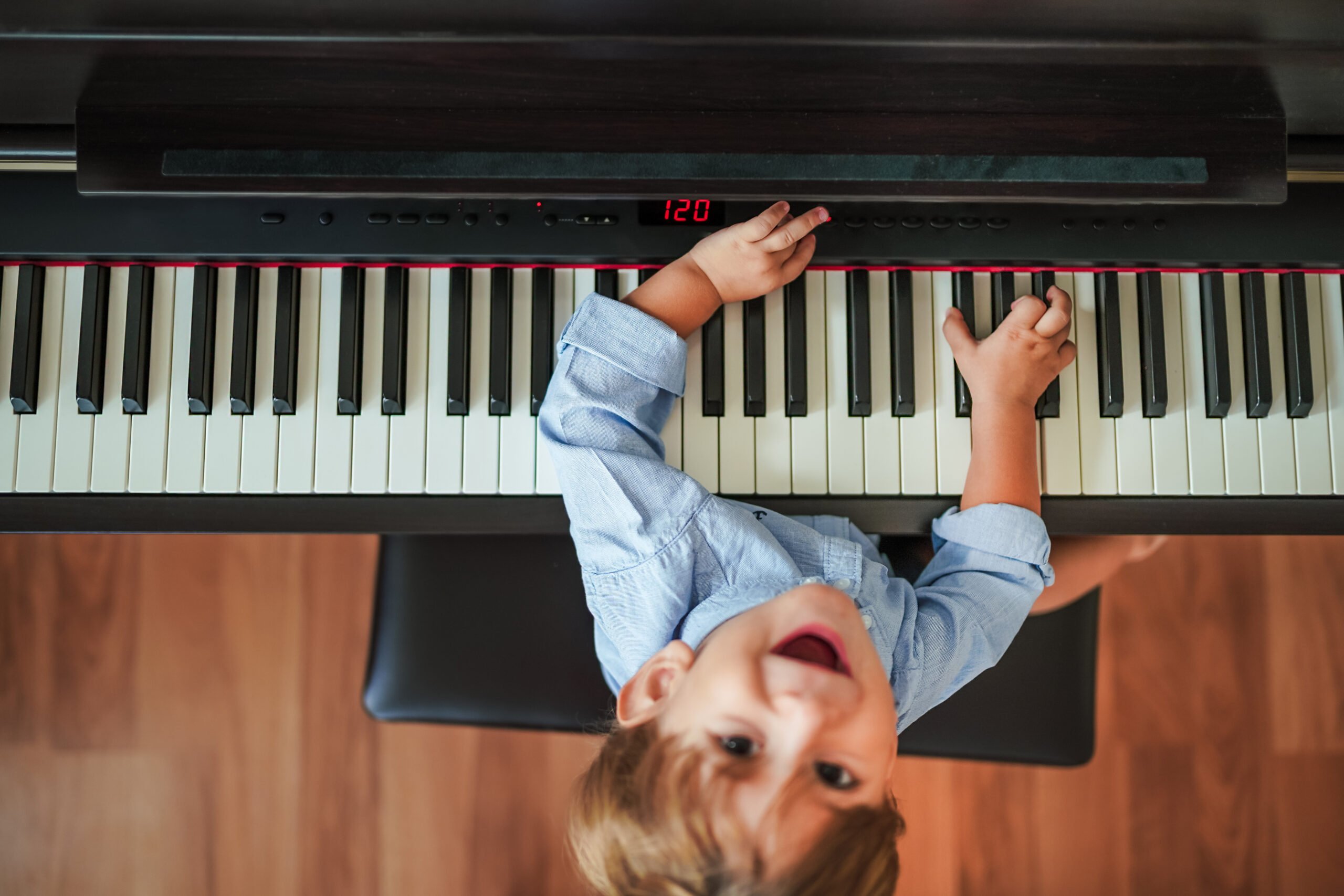 Baby boy curious about to learning Piano
