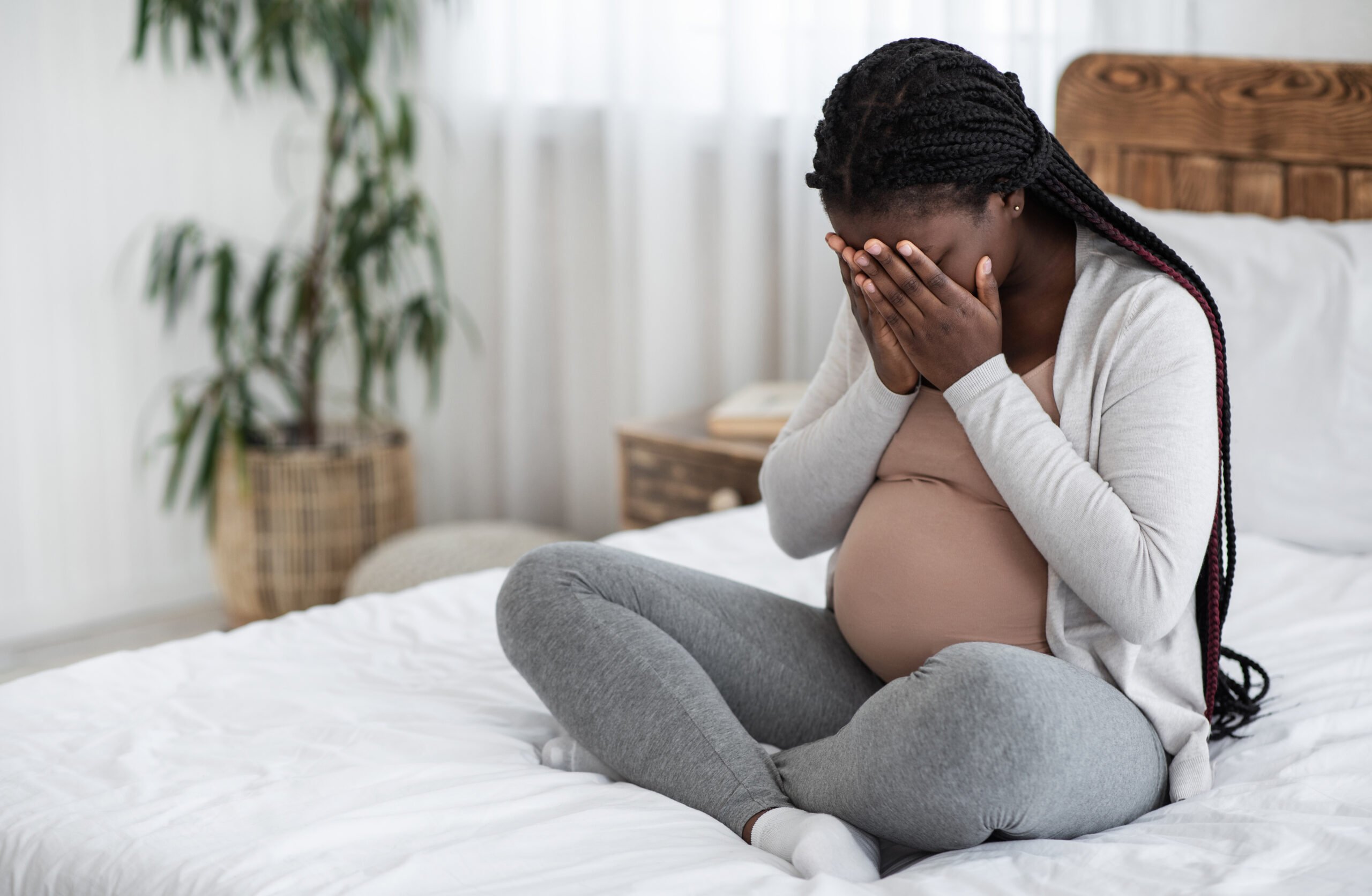 sad pregnant woman