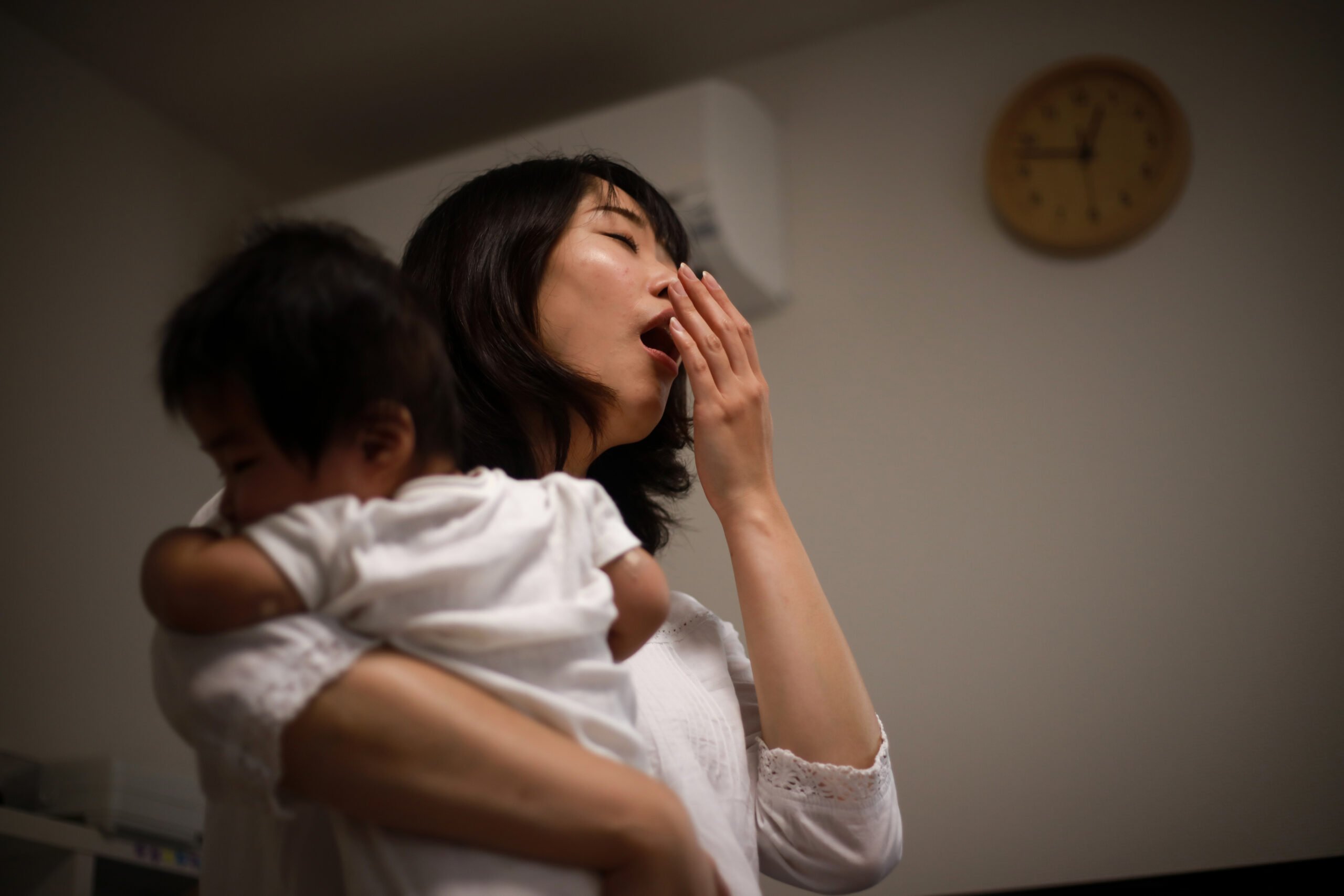 mom taking care of baby at night
