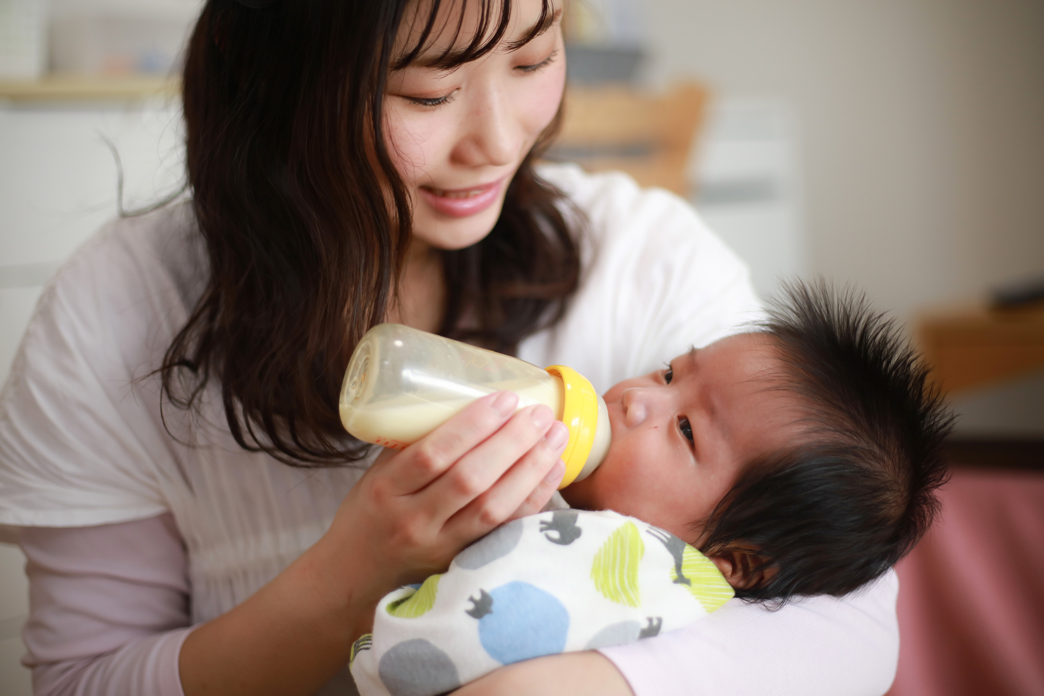 Mother feeding her baby