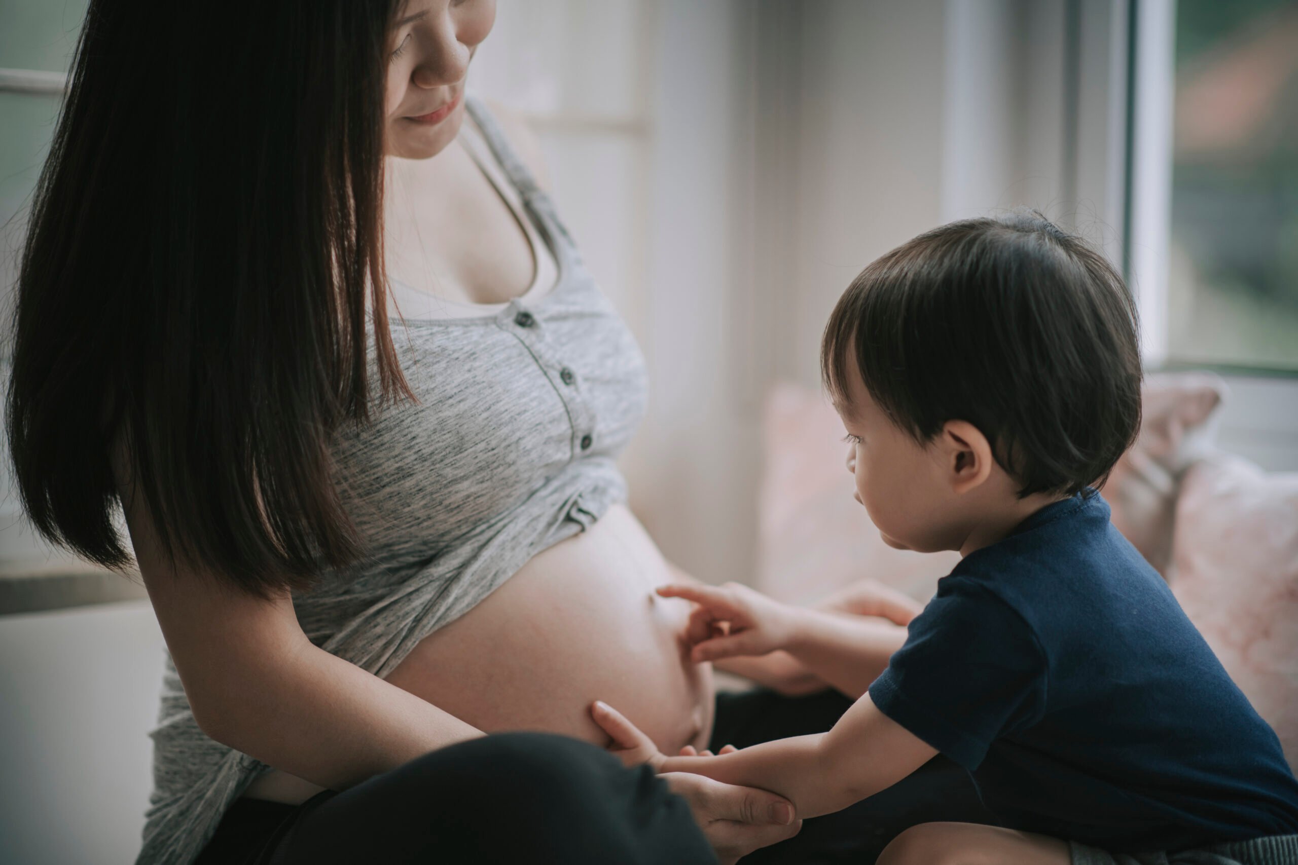 pregnant mom with toddler, baby shower alternatives