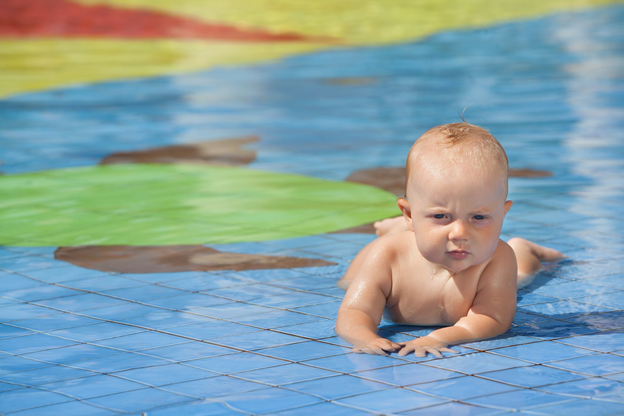 Happy child in swimming pool