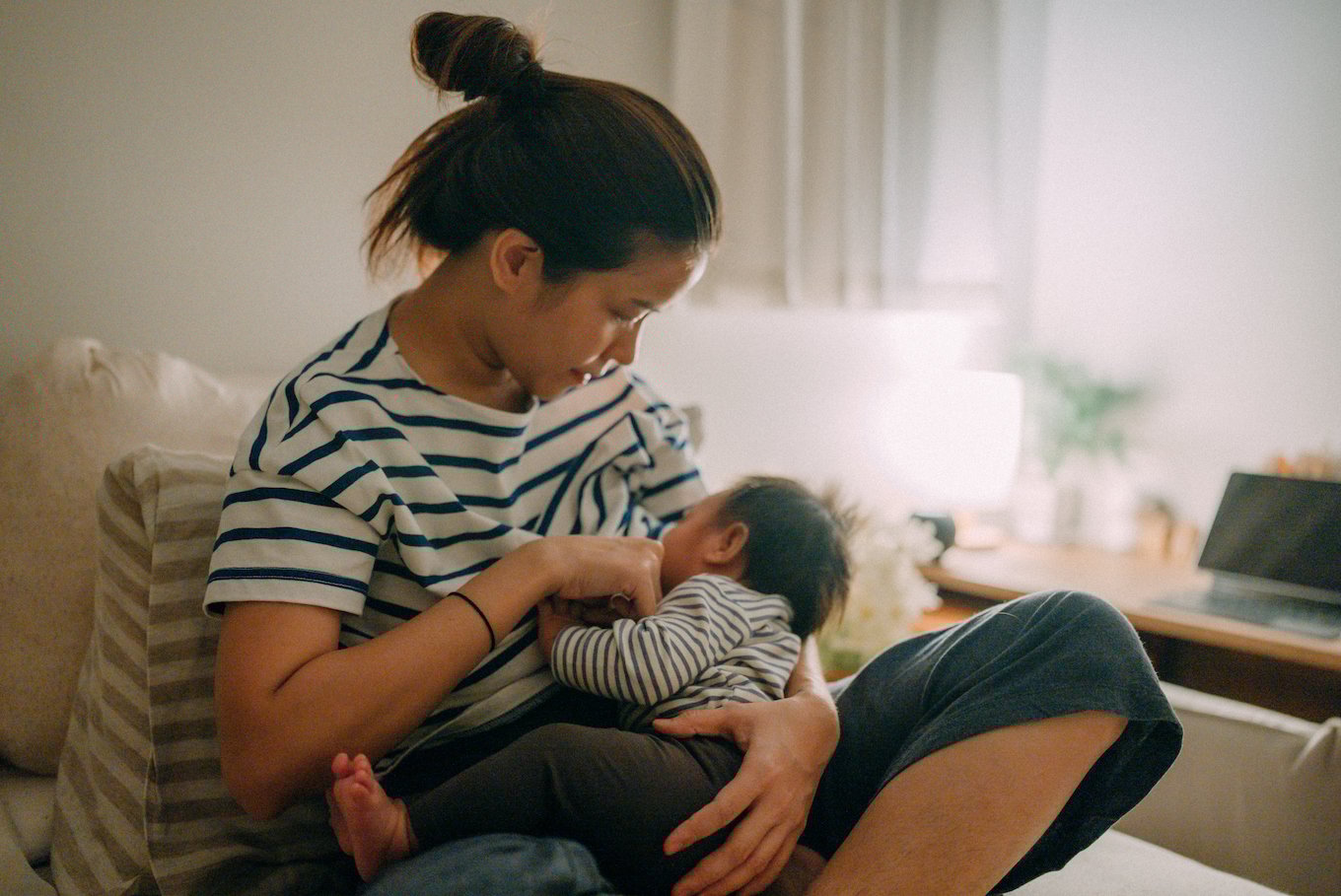 Mother breastfeeding baby.