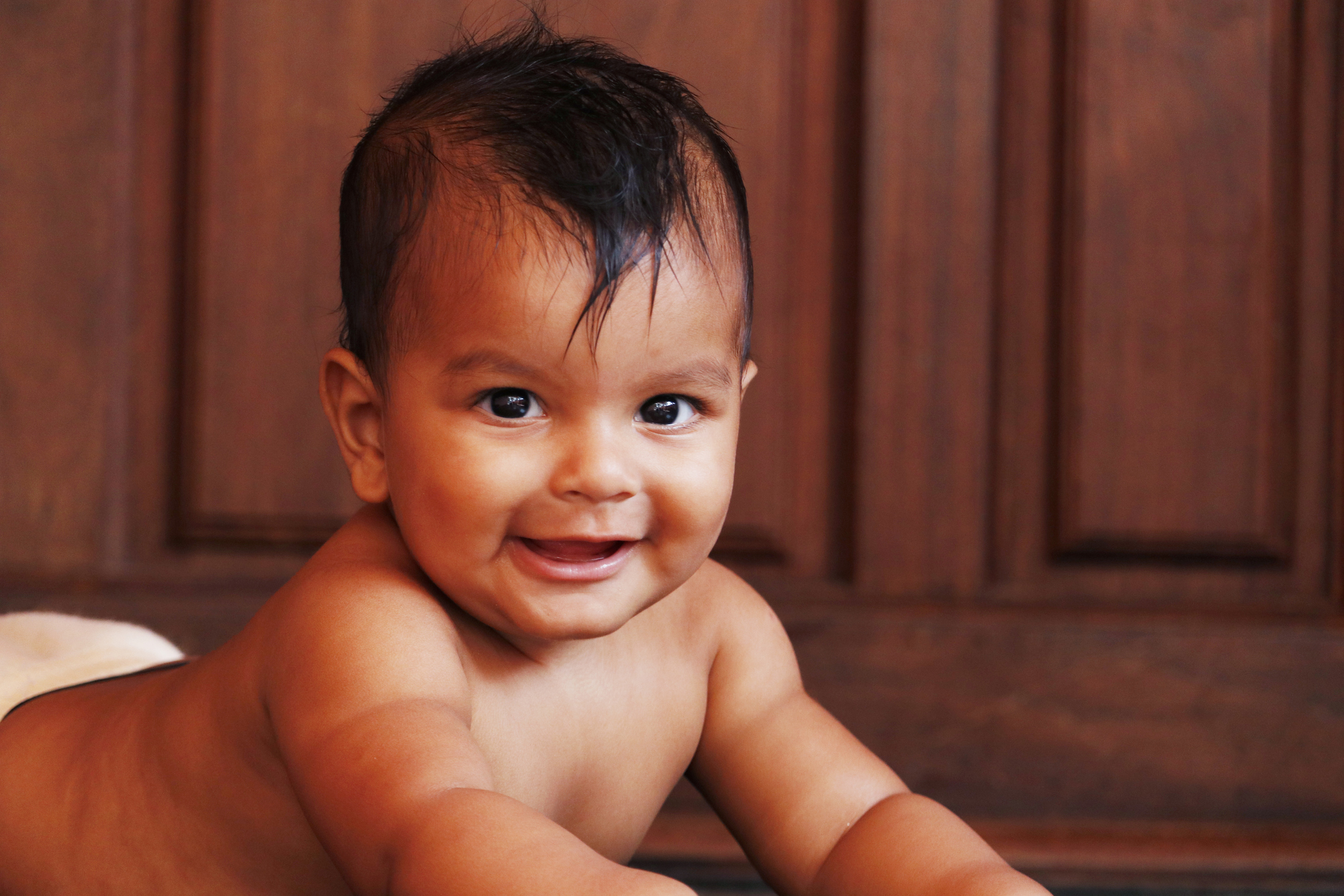 young indian baby boy looking with smily face