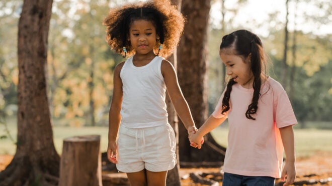 adoptive-siblings-holding-hands