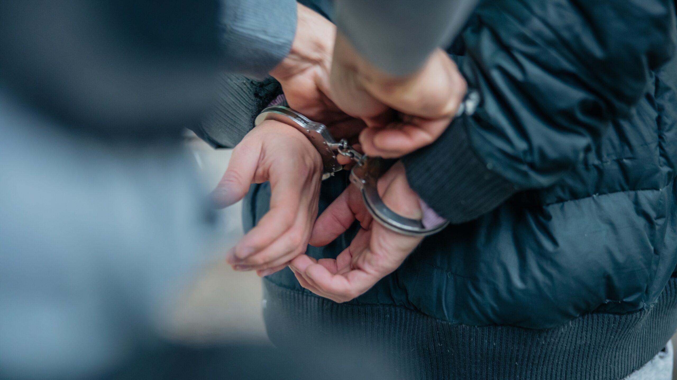A person in handcuffs