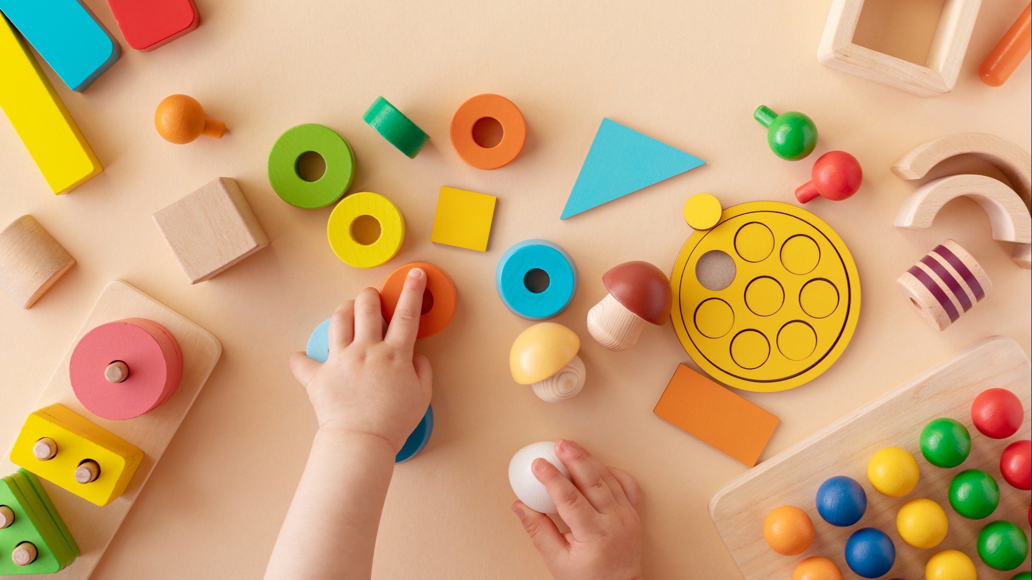 A kid playing with toys