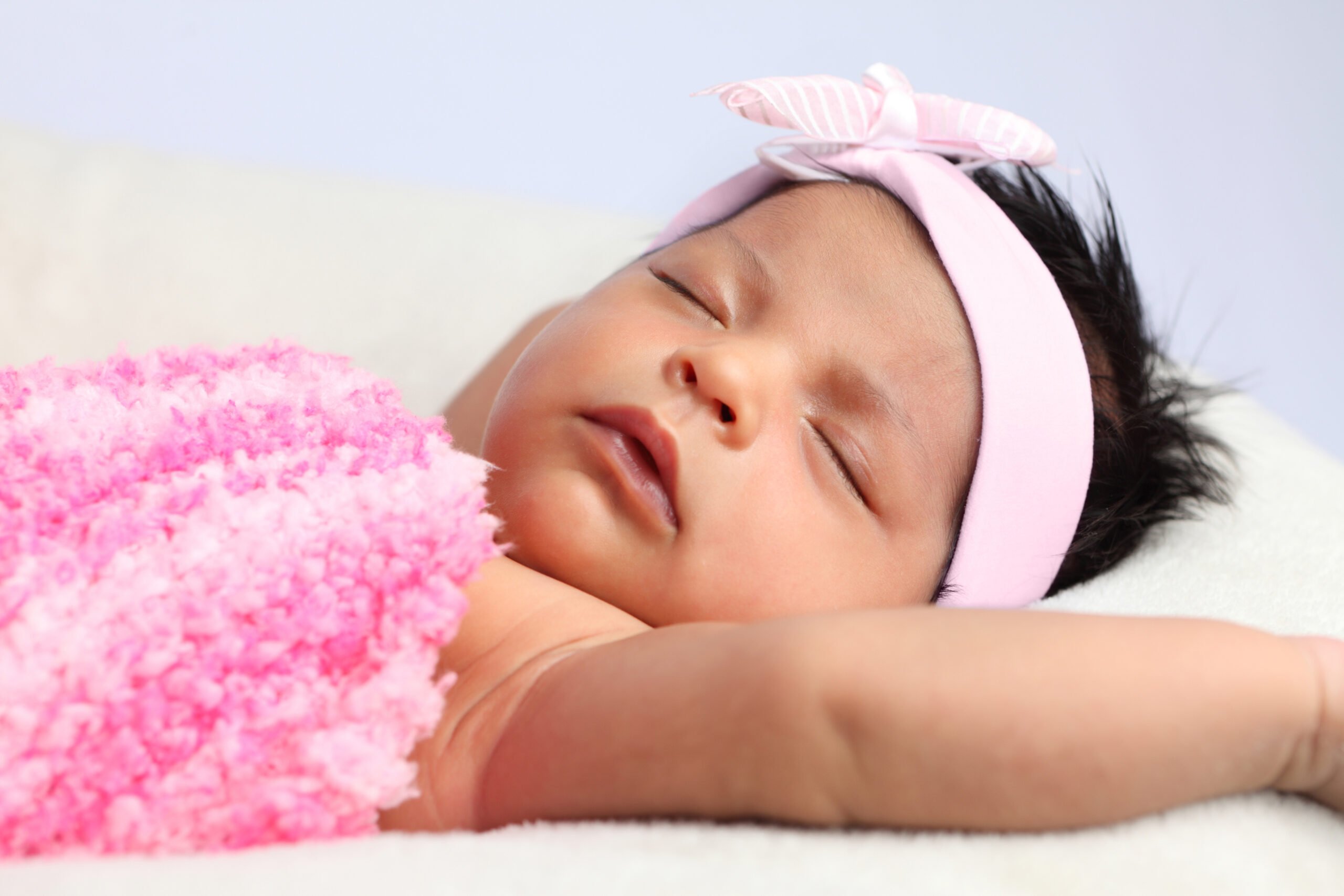 Newborn Baby with Pink Bow