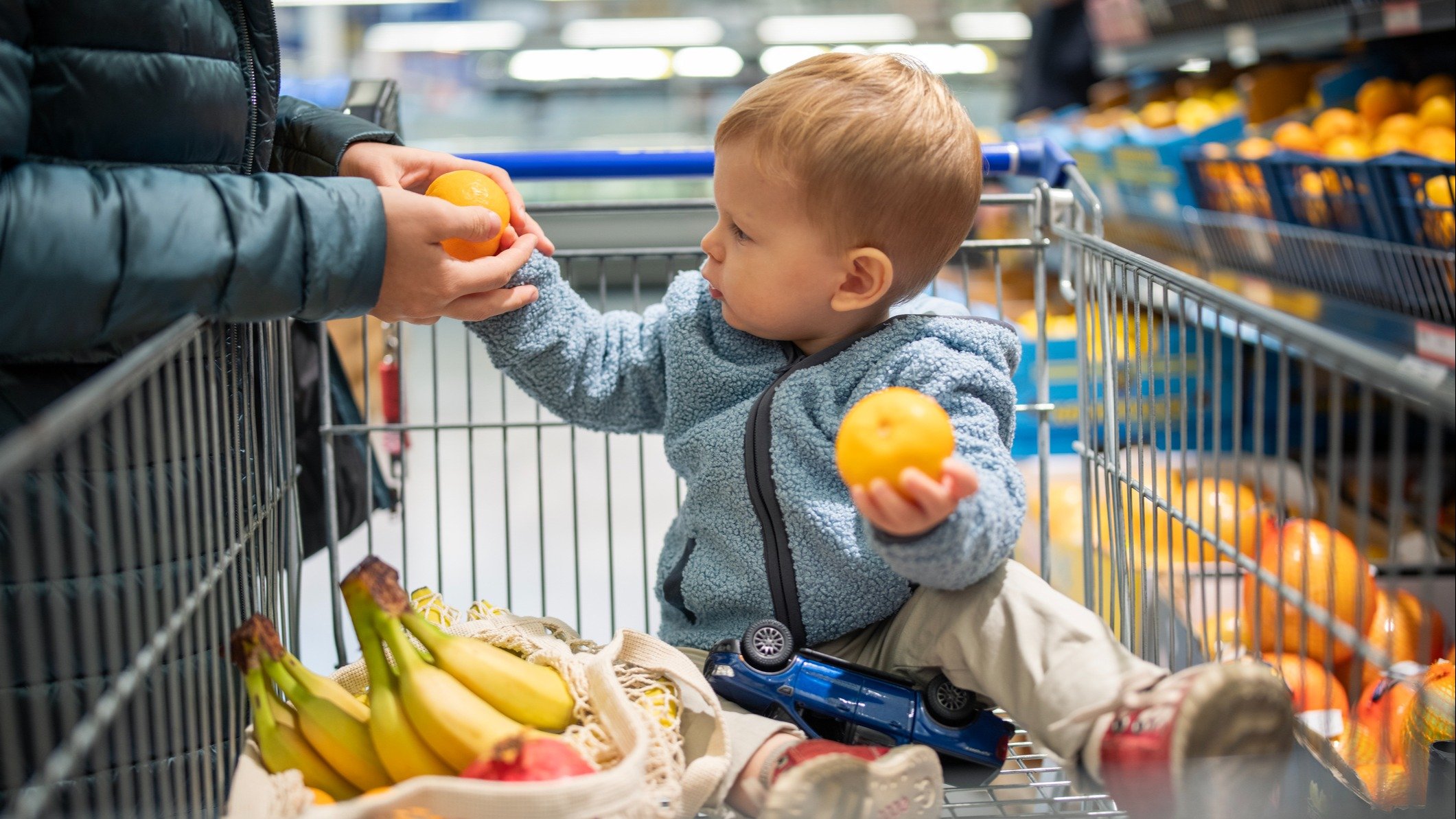 Baby in shopping cart