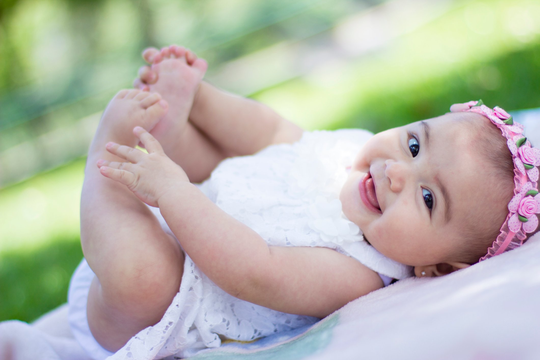 Happy baby girl having fun