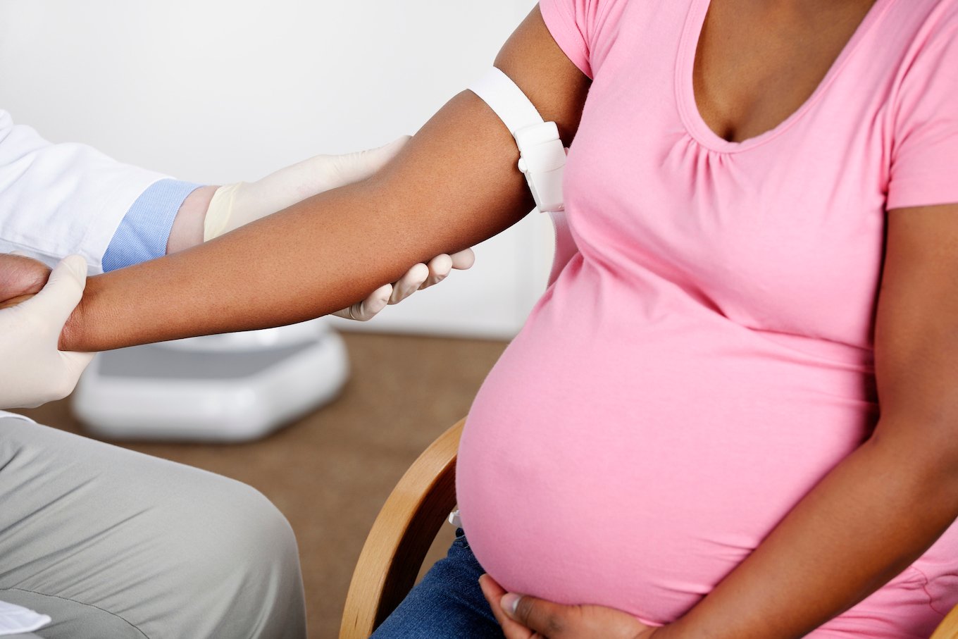 Heavily Pregnant Woman Having A Medical