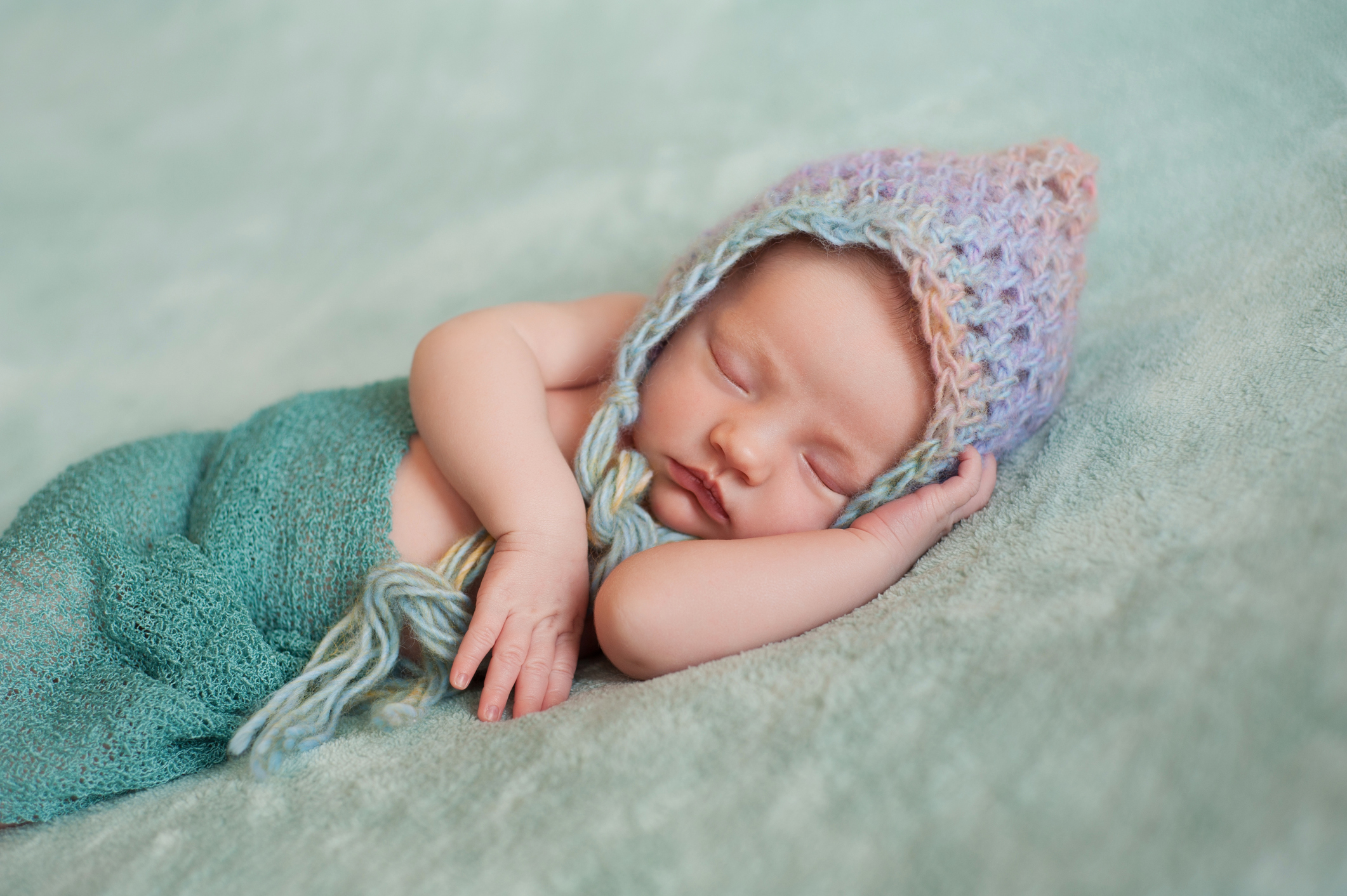 Newborn Baby Girl Wearing a Pixie Hat