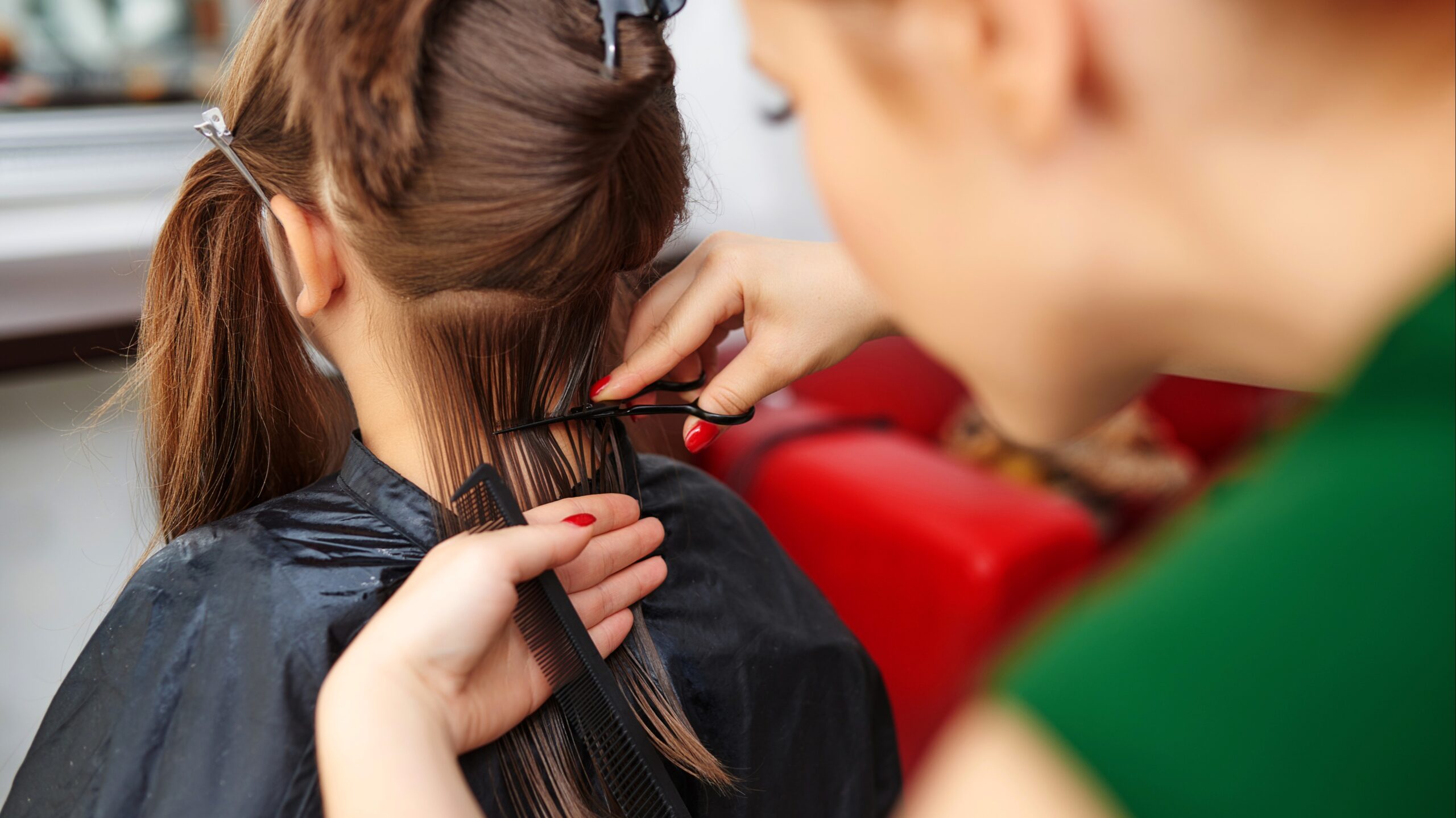 A kid getting a haircut