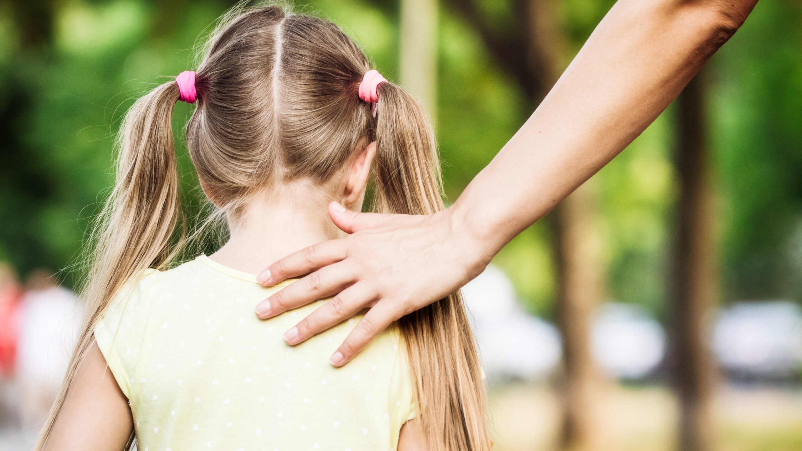 little girl in pigtails