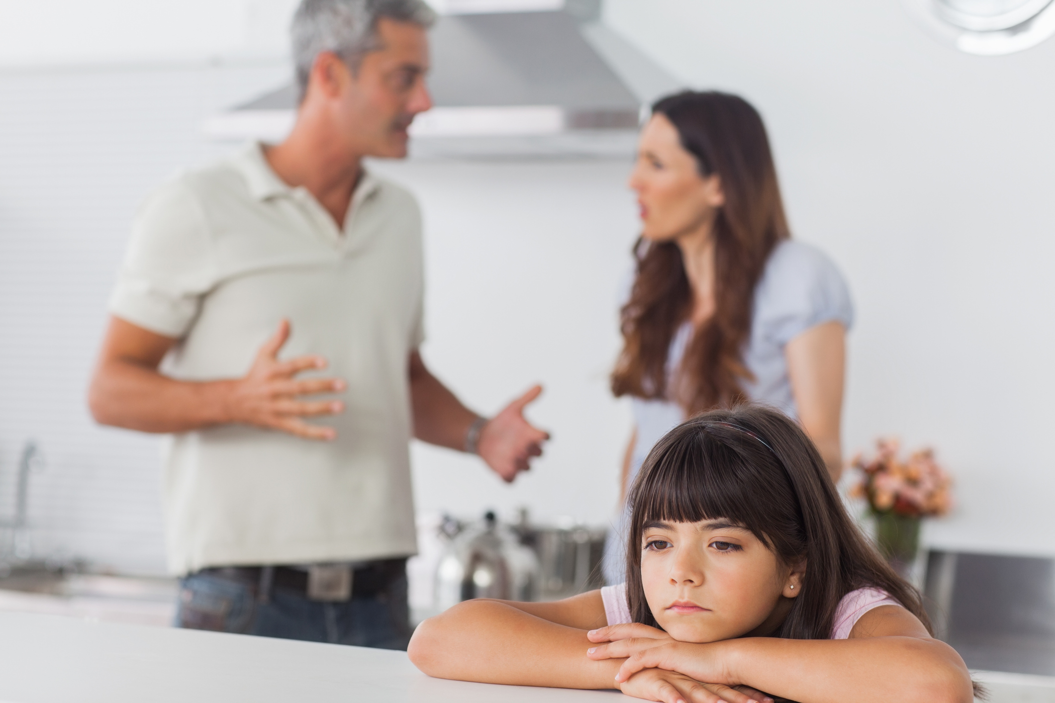 couple arguing in front of kids
