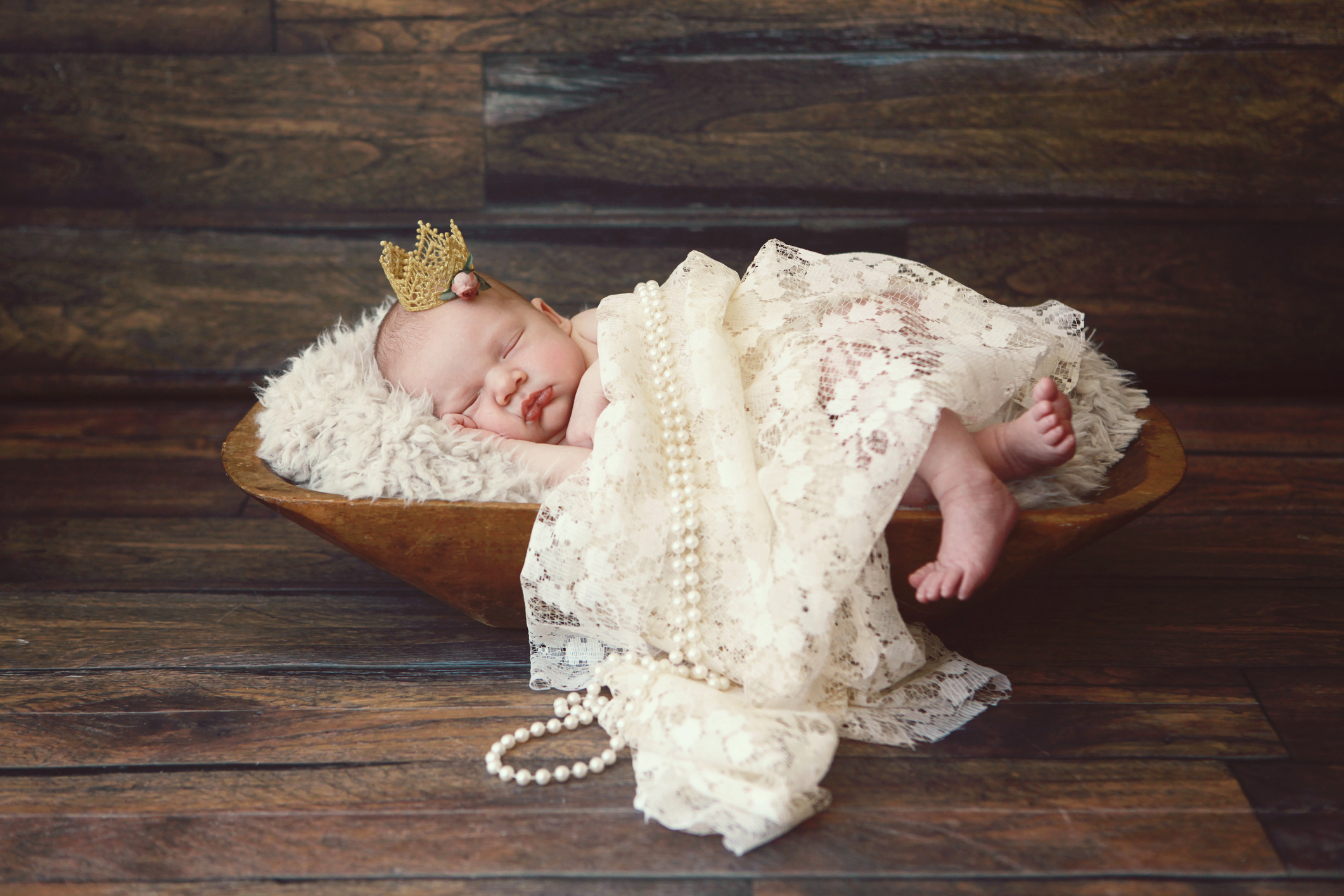 Newborn Baby Girl Wearing Crown