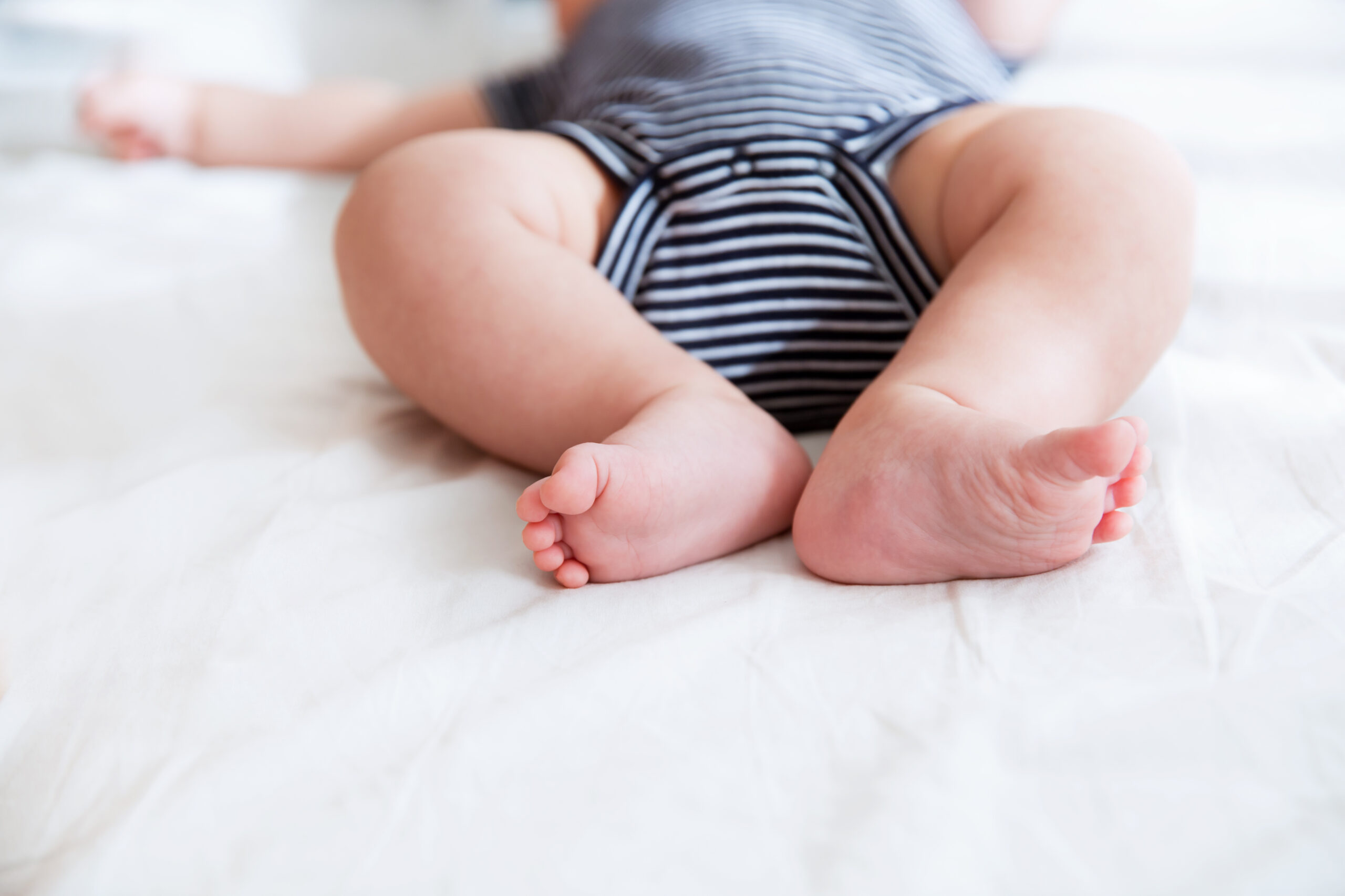 Close-up legs of a newborn baby