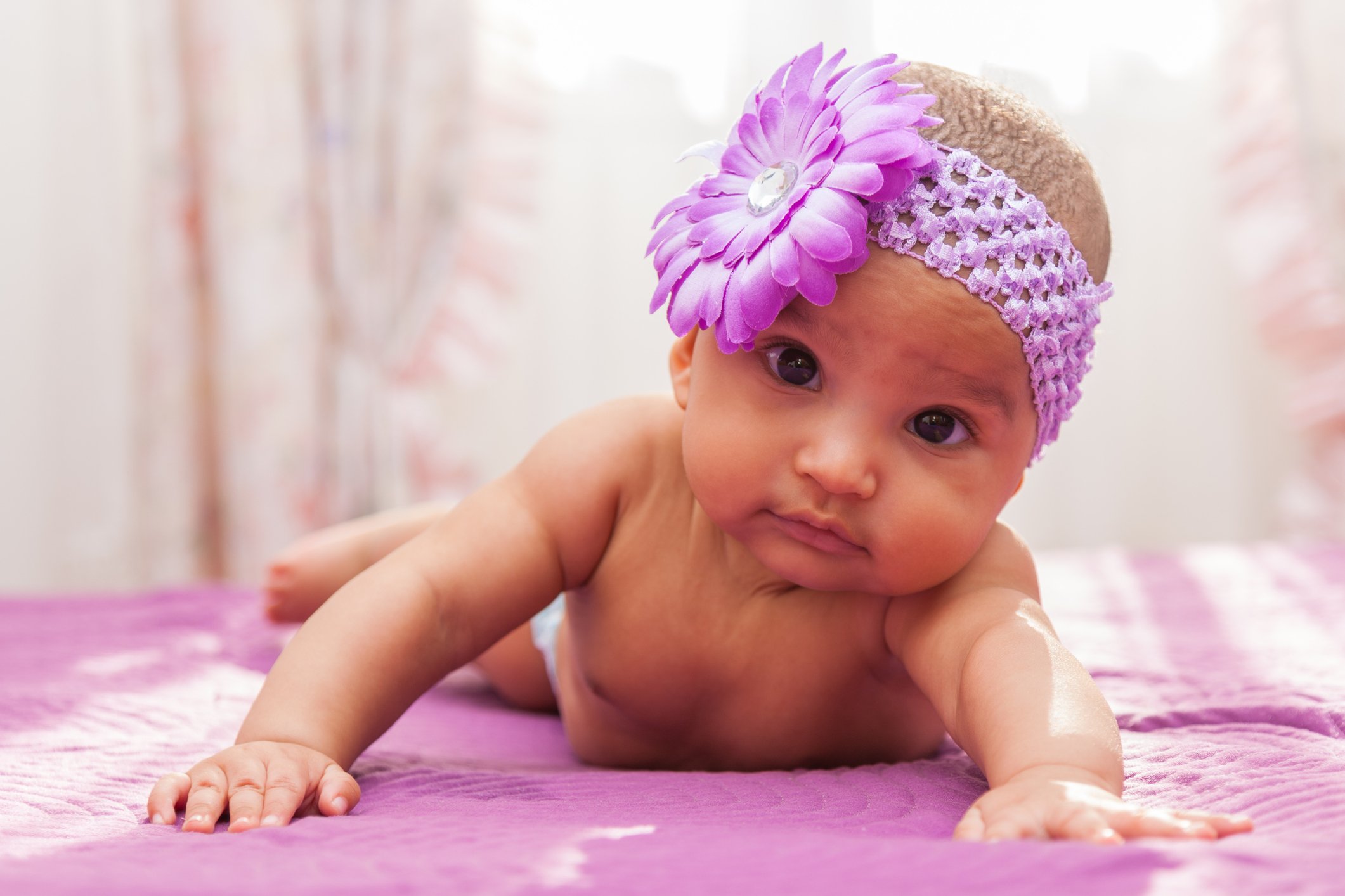 Adorable little african american baby girl looking