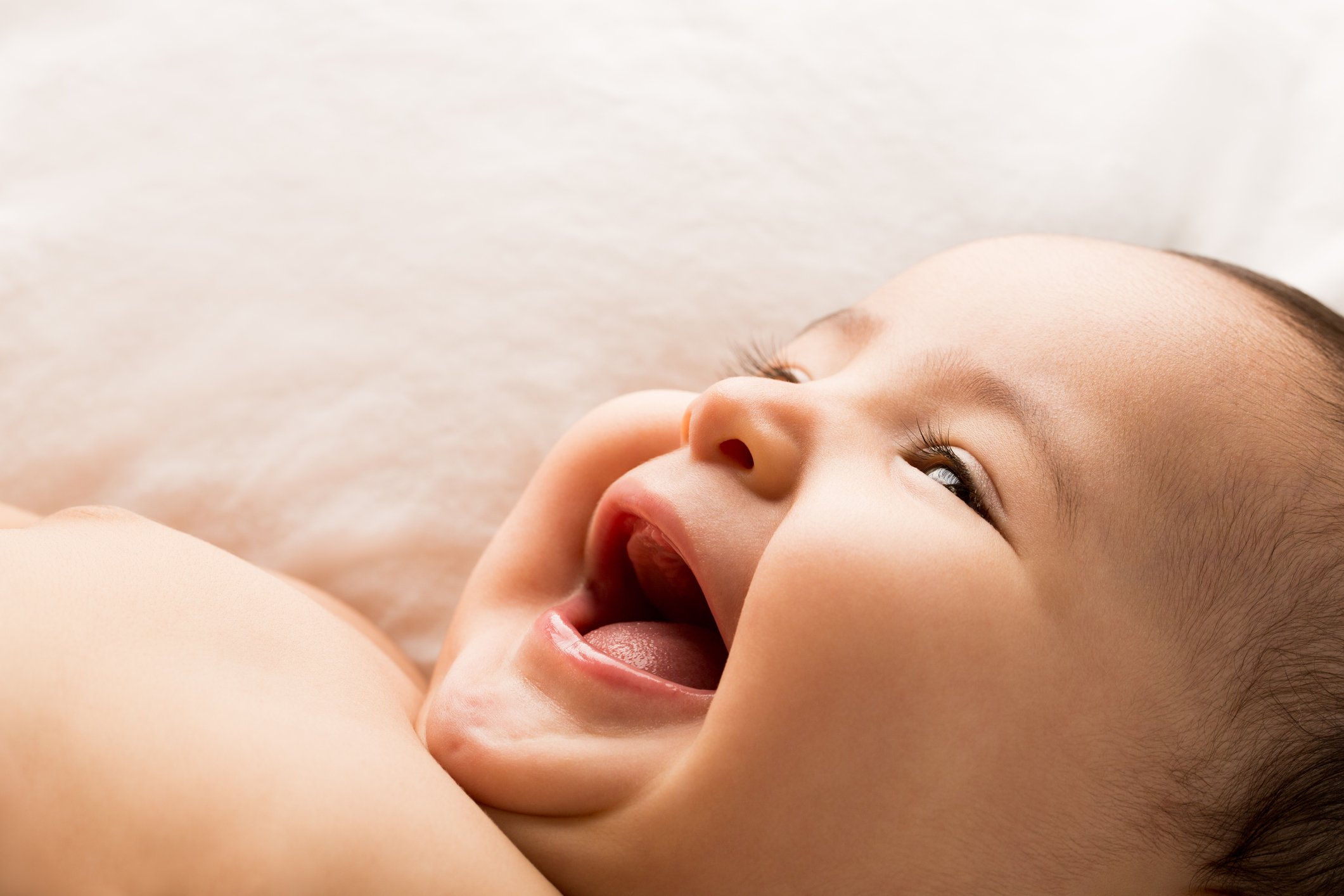 Cute baby girl on bed