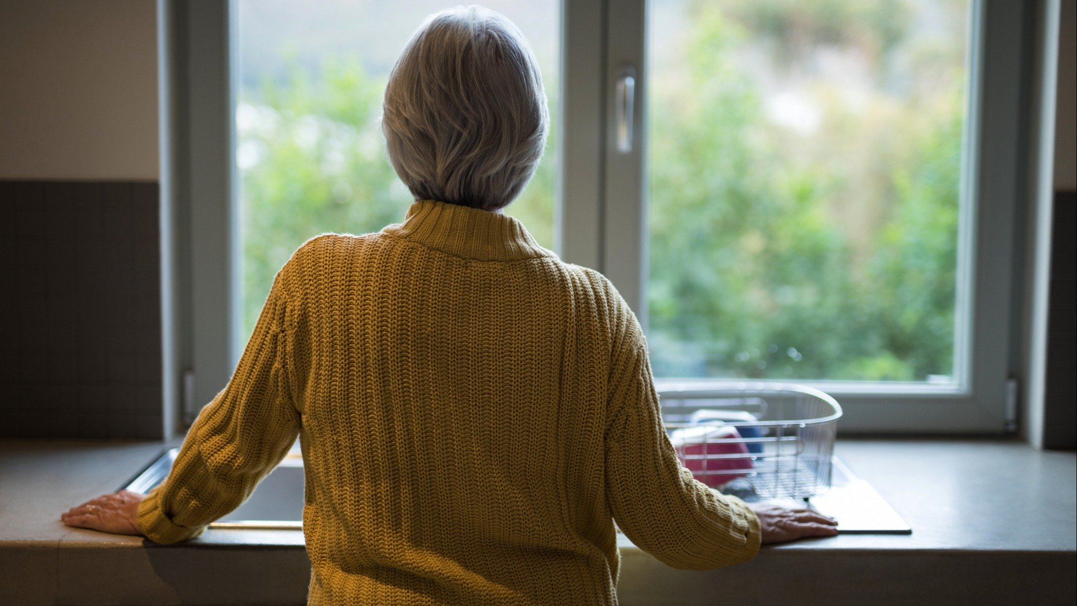 A woman looking out the window