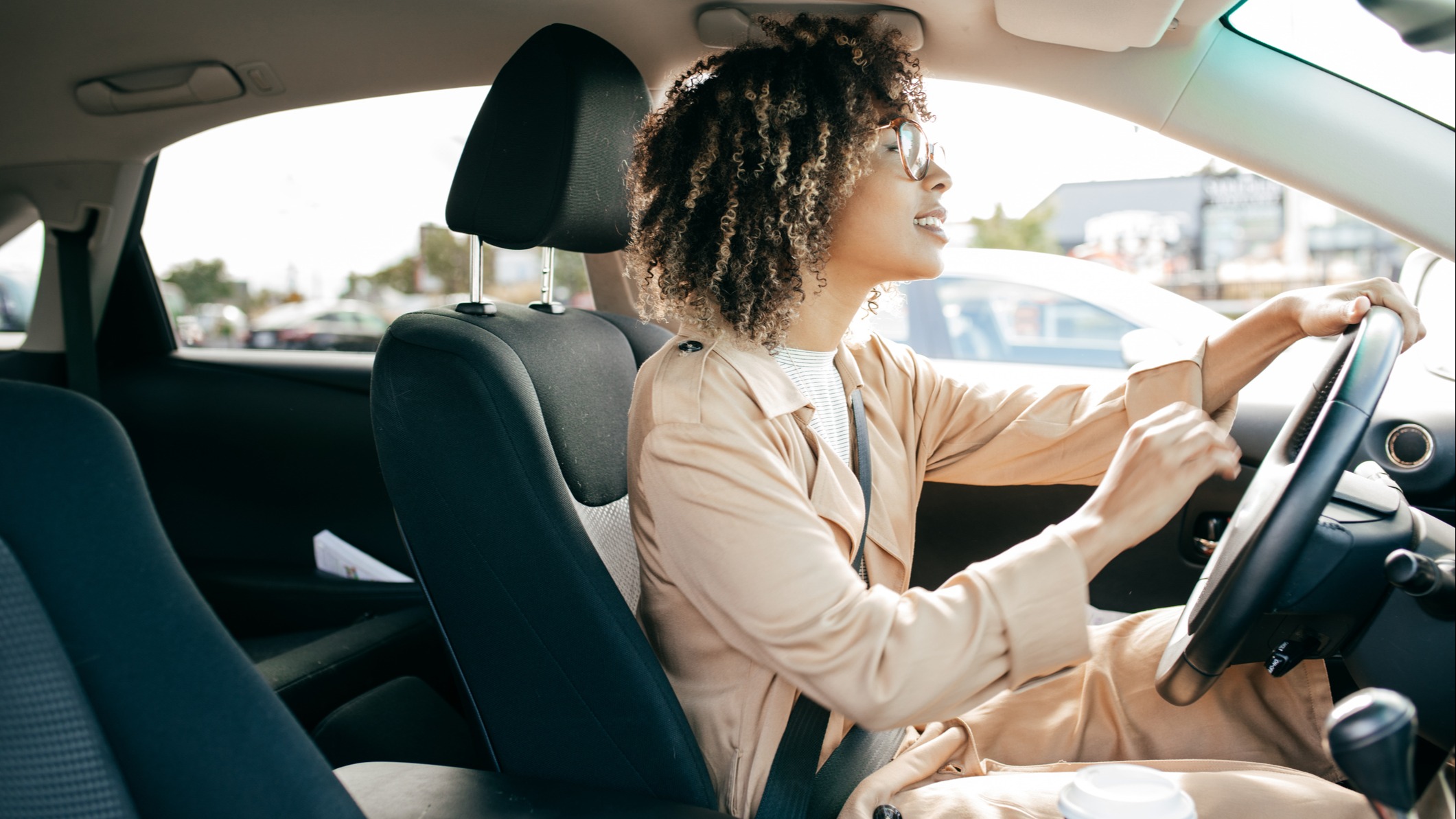 A mom driving a car