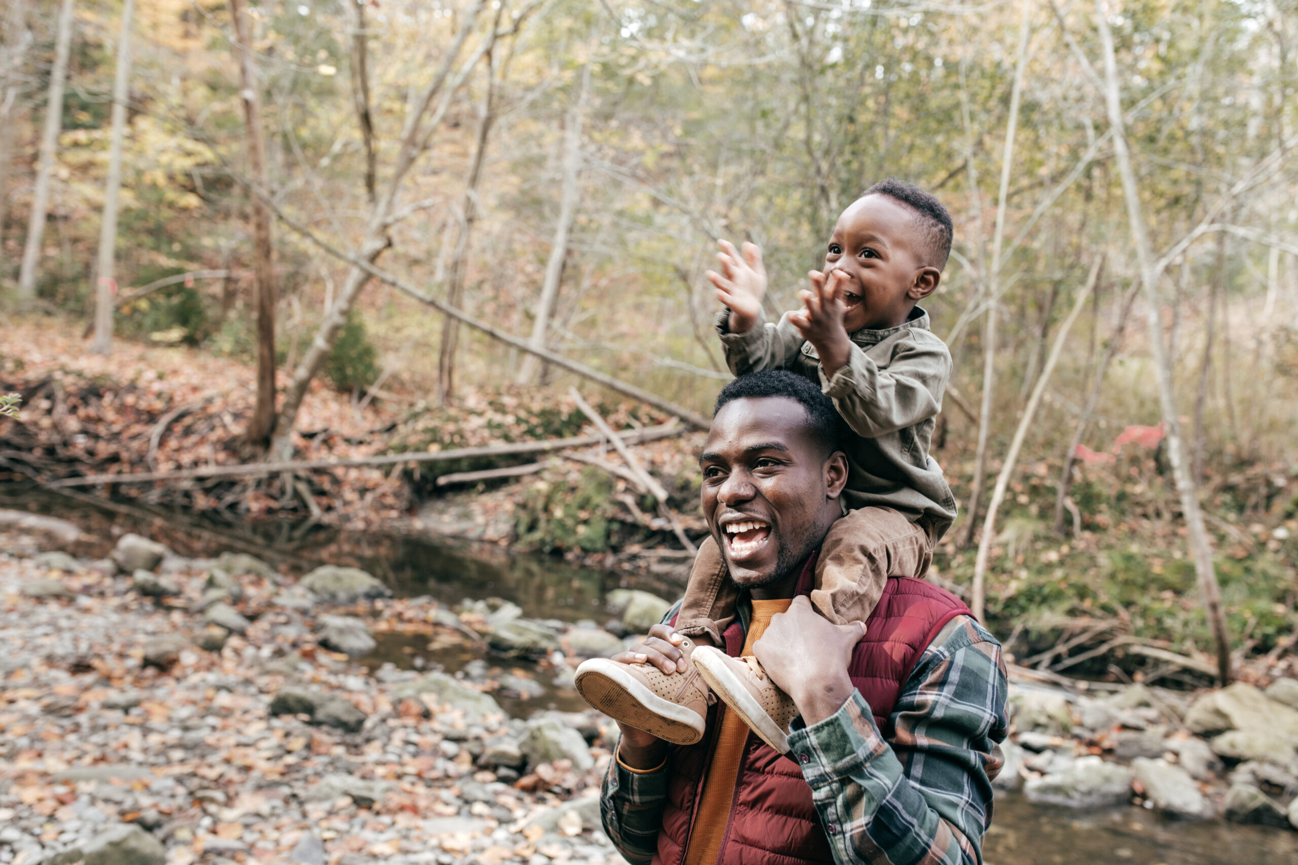 BEst dad holding son on shoulders