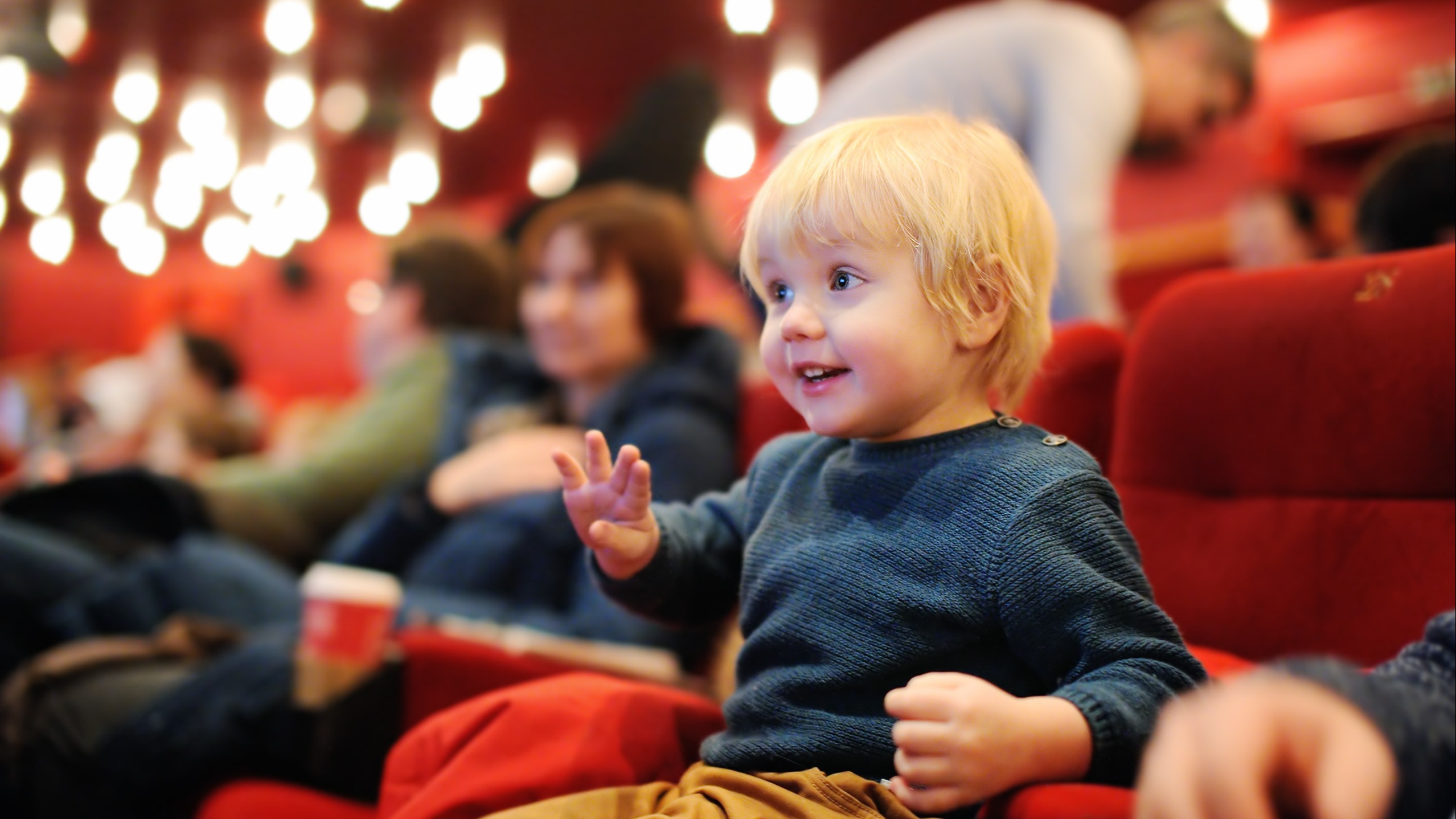 A little kid at the movies