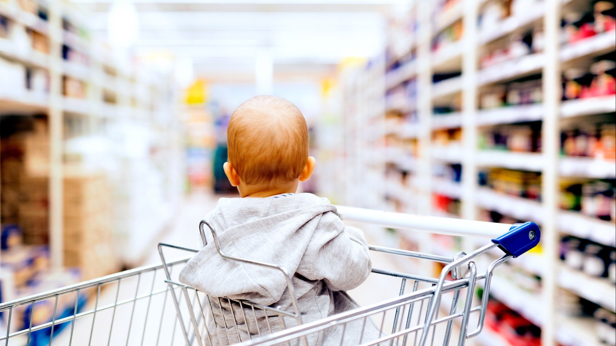 Kid in a shopping cart