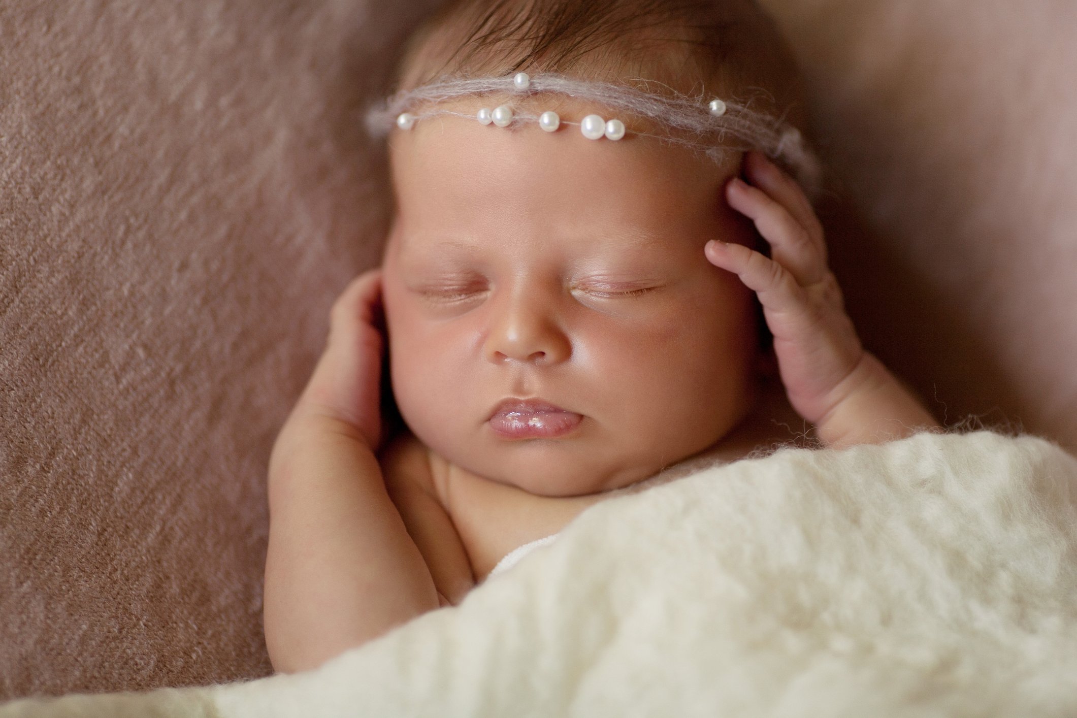 Sleeping newborn girl