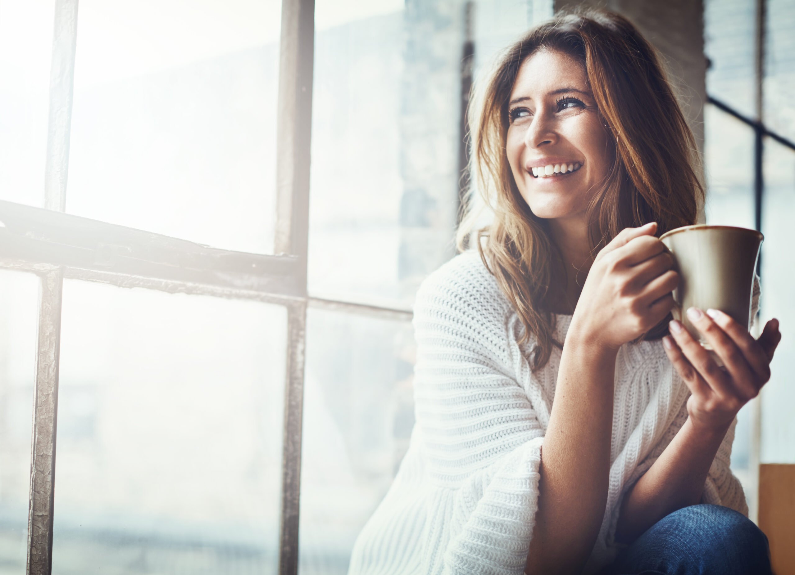 woman holding coffee