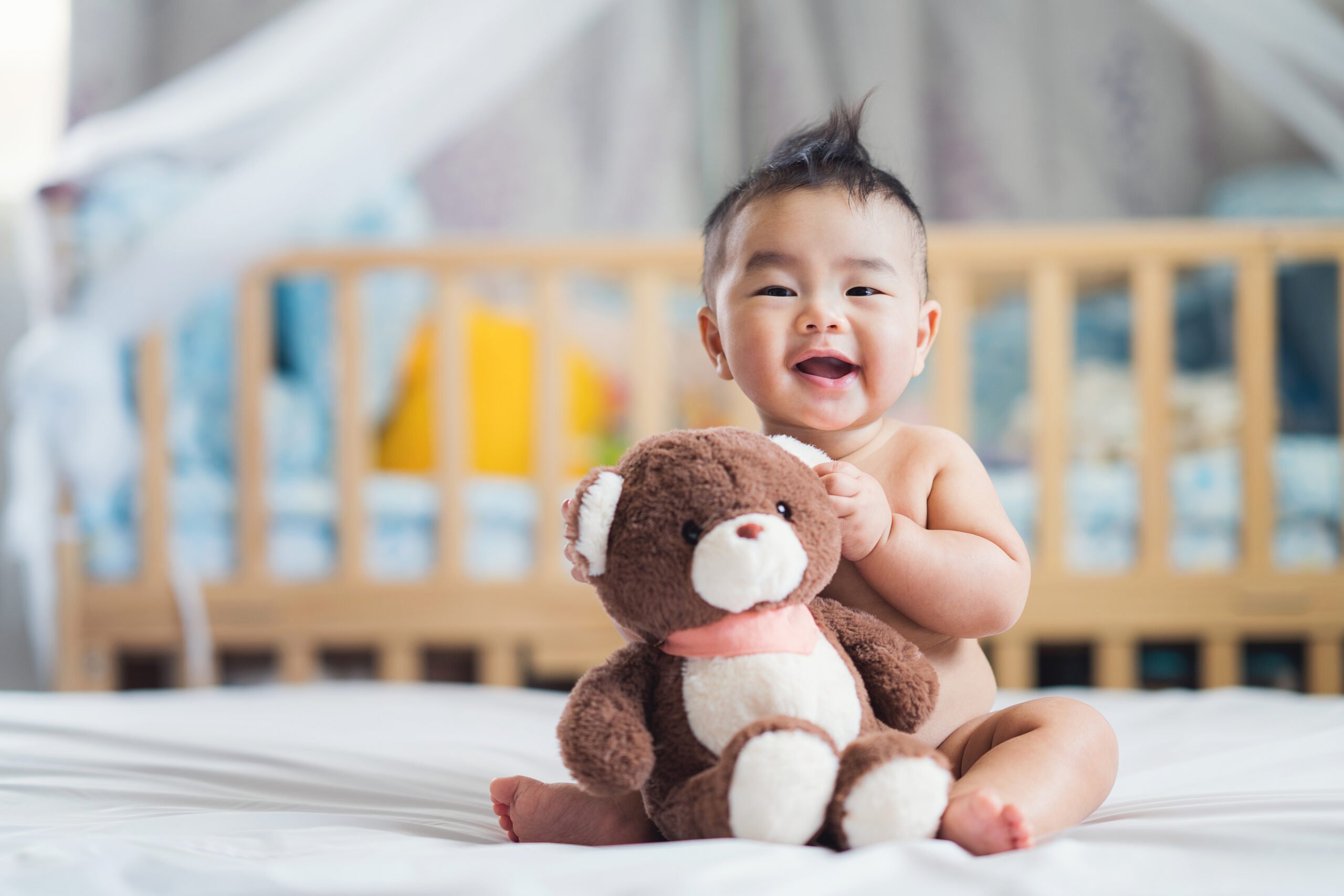 baby with teddy bear