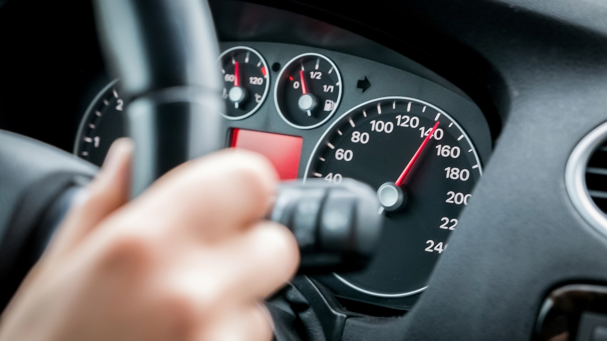 A person driving a car